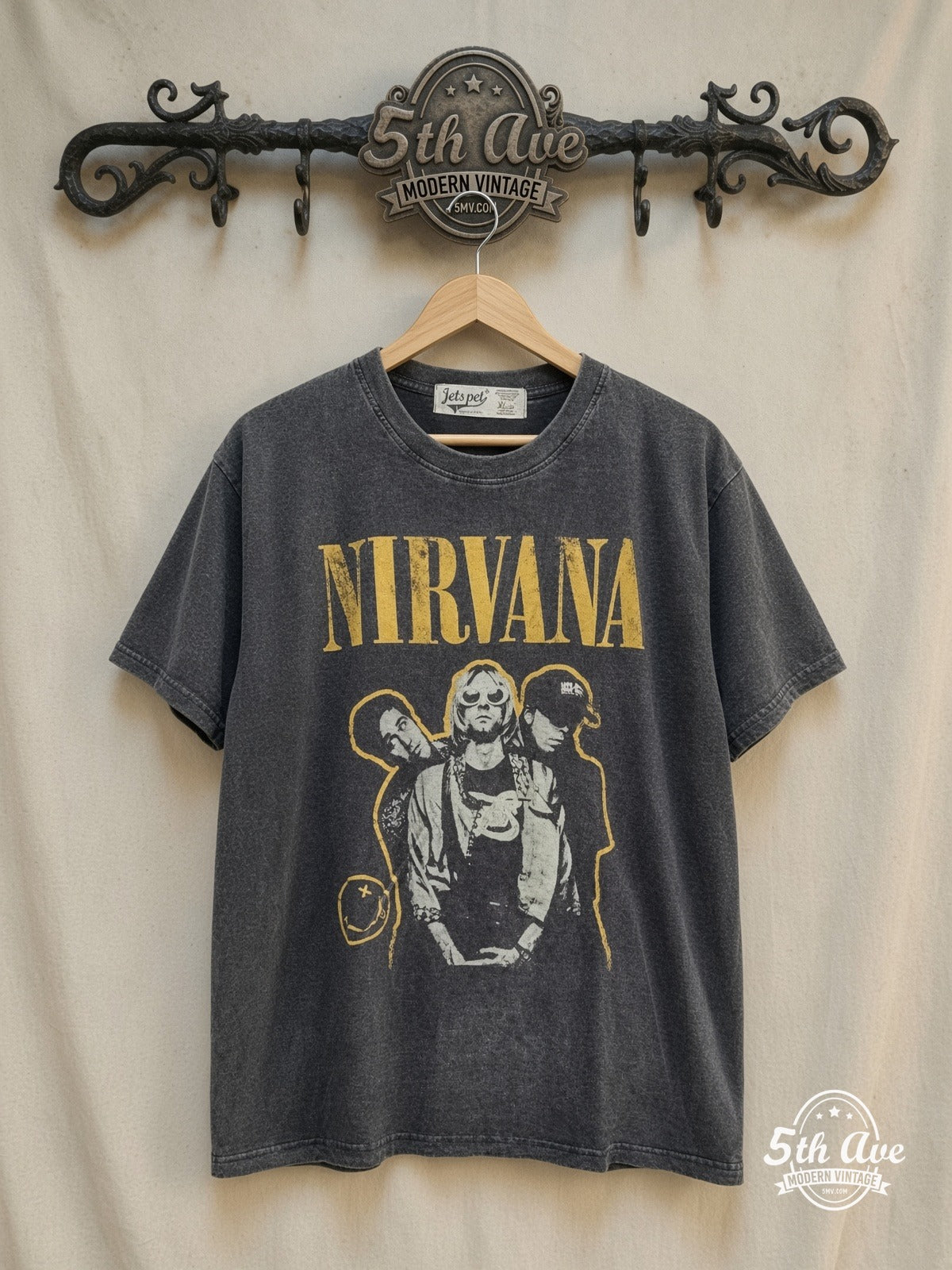 Nirvana – Yellow Outline Kurt Sunglasses – Vintage Band T-Shirt — front on locked cream ornate 5th Ave rack