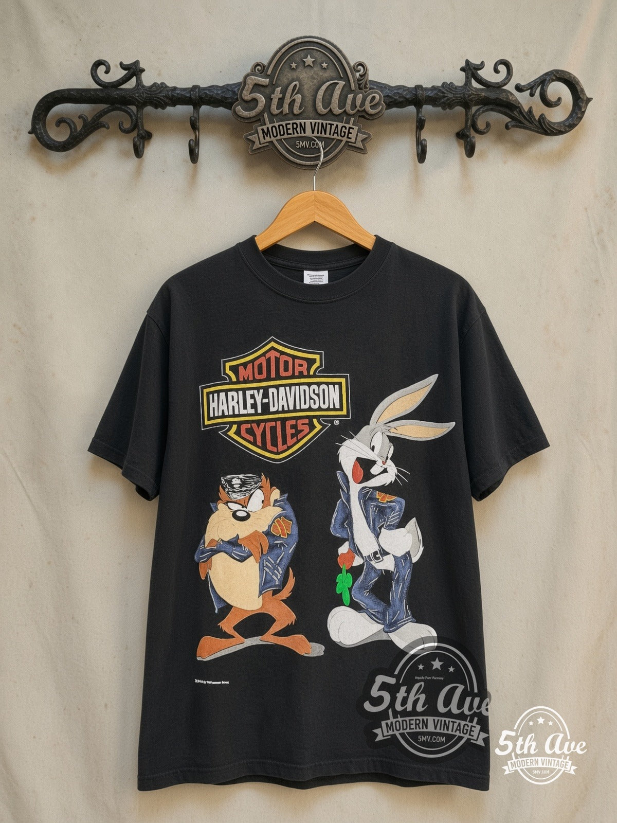 Harley-Davidson – Bugs Bunny & Taz Saints Butte MT – New Vintage Graphic Tee — front on locked cream ornate 5th Ave rack