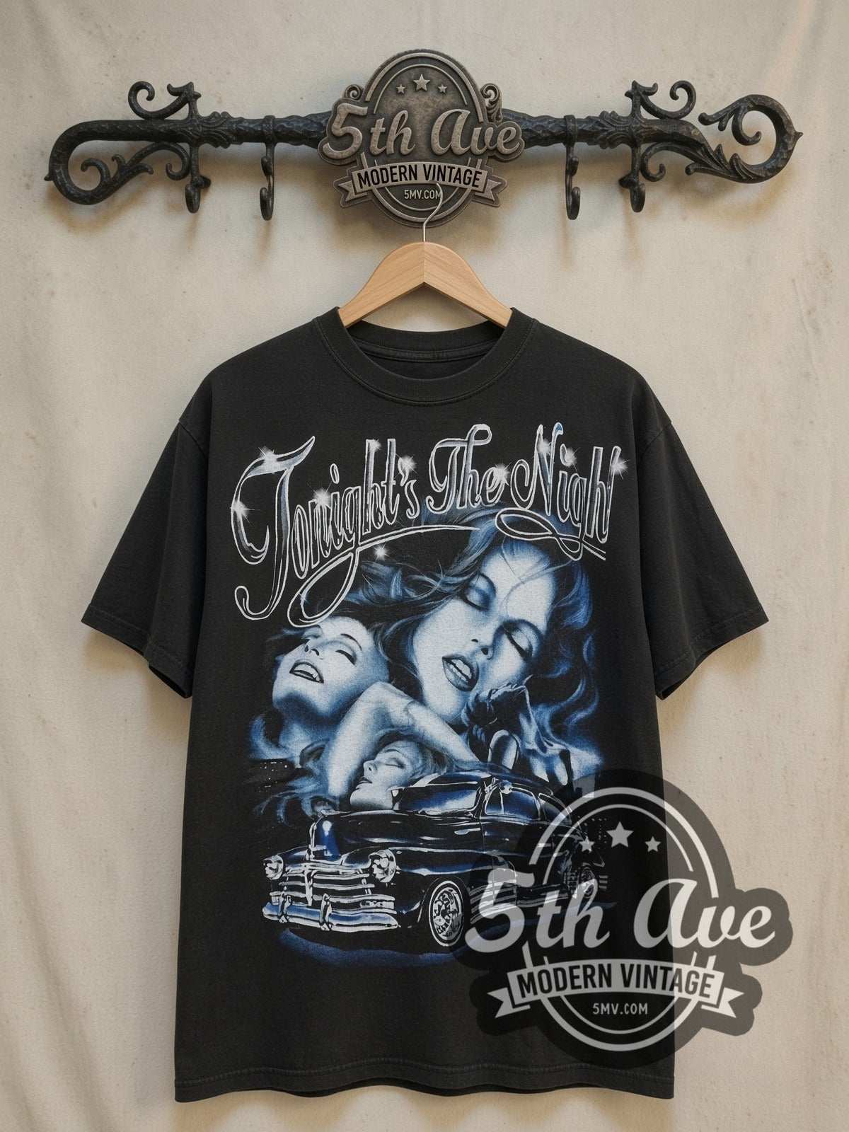 Rollin Hard Tonight's the Night Lowrider vintage graphic tee, front view on a display rack