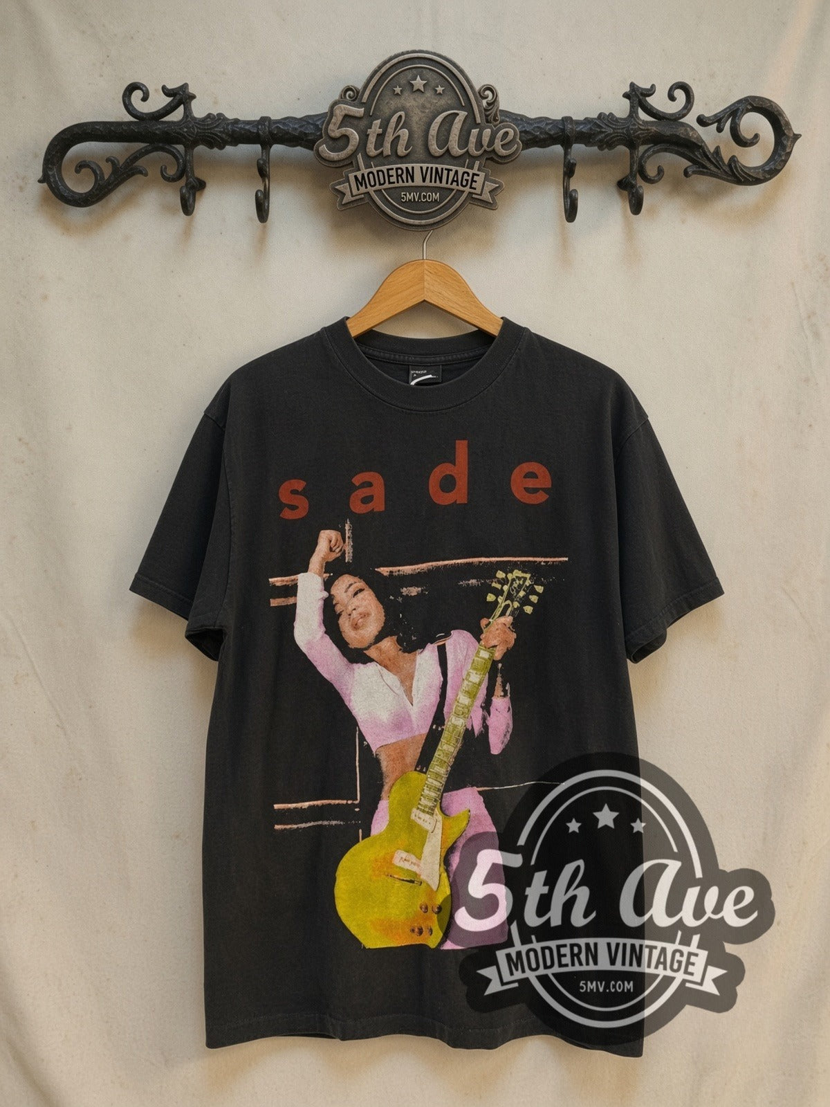 Sade Summer Deluxe Tour 1993 vintage band t-shirt in black, front view on a display rack