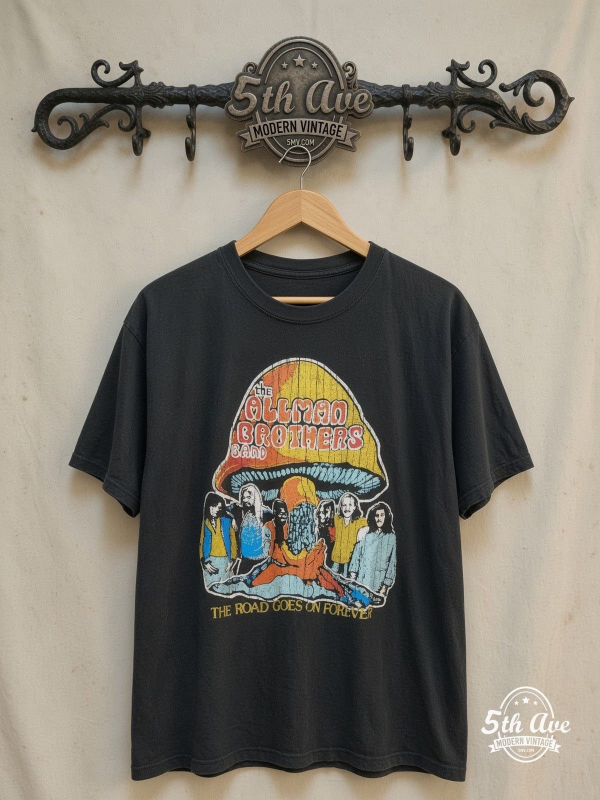 The Allman Brothers Band – The Road Goes On Forever – Vintage Band T-Shirt — front on locked cream ornate 5th Ave rack