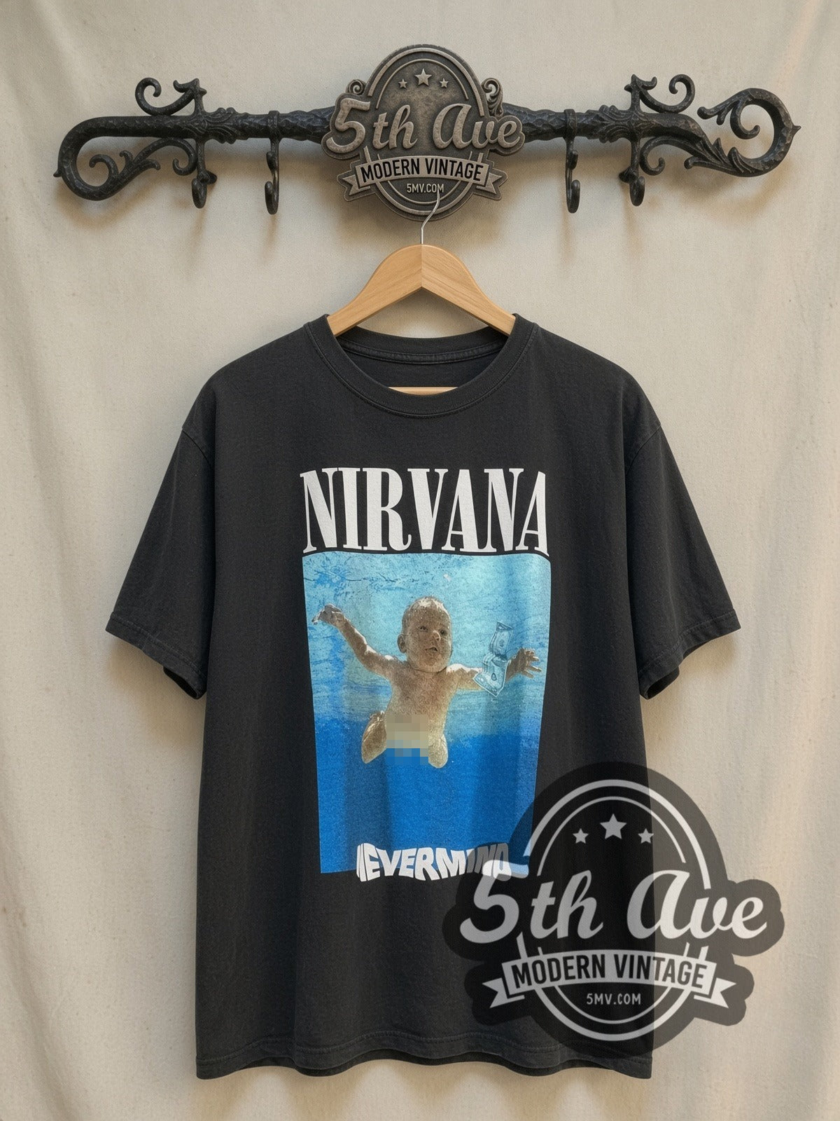 Nirvana Nevermind Swimming Baby Album Cover vintage band t-shirt, front view on a display rack