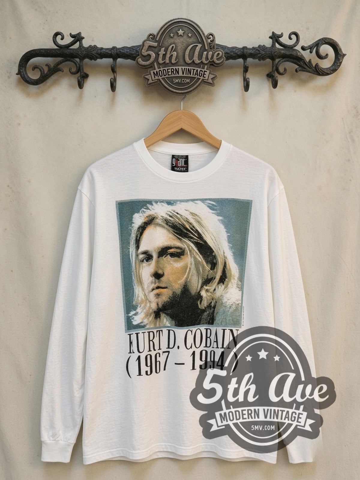 Kurt Cobain Legacy Tribute vintage band long sleeve t-shirt, front view on a display rack