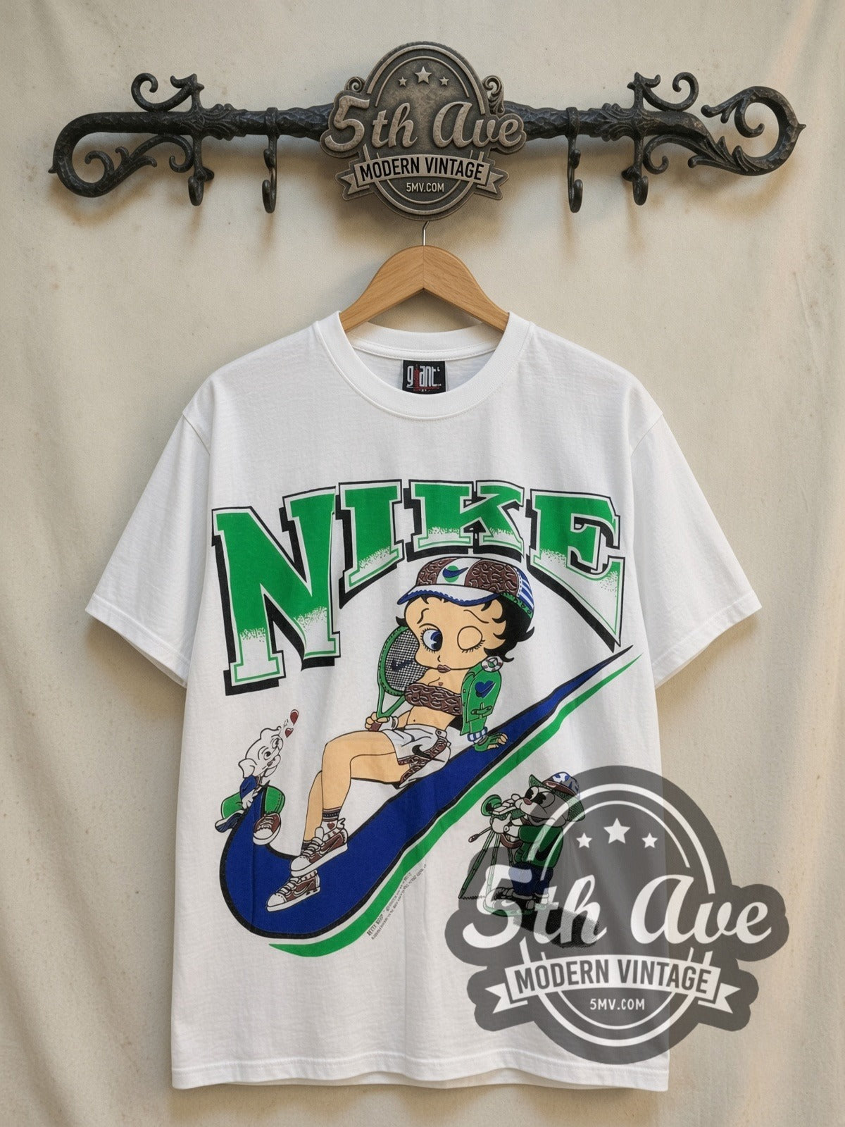 Betty Boop x Nike vintage cartoon tee, front view on a display rack
