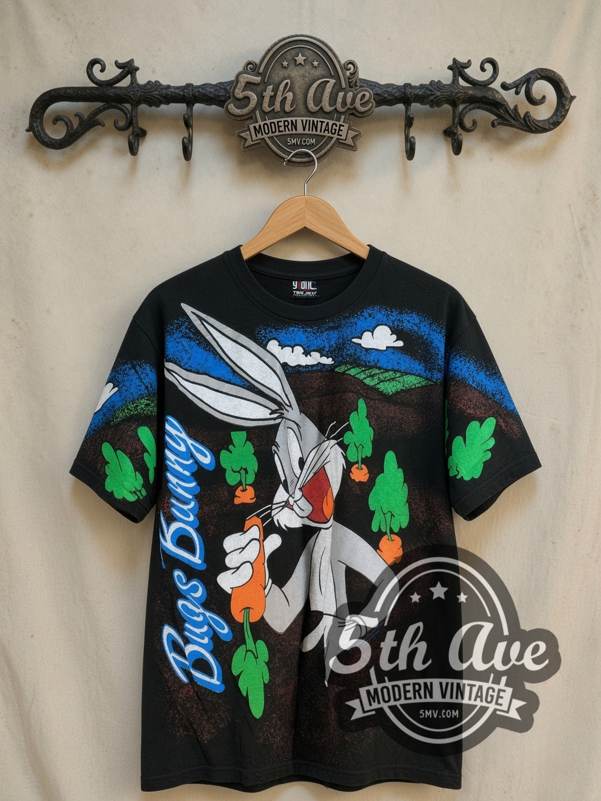 Bugs Bunny Retro all-over-print vintage cartoon tee, front view on a display rack