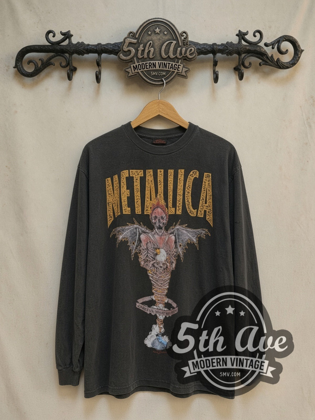 Metallica King Nothing Careful What You Wish long sleeve vintage band t-shirt, front view on a display rack