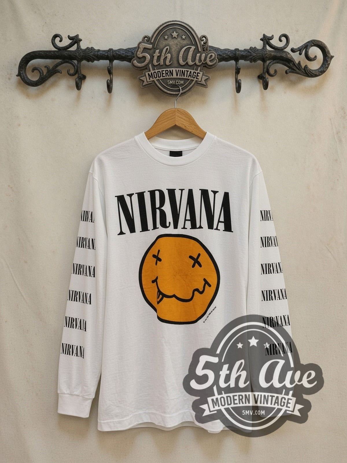 Nirvana and Butthole Surfers Chokebore Concert vintage band t-shirt, front view on a display rack