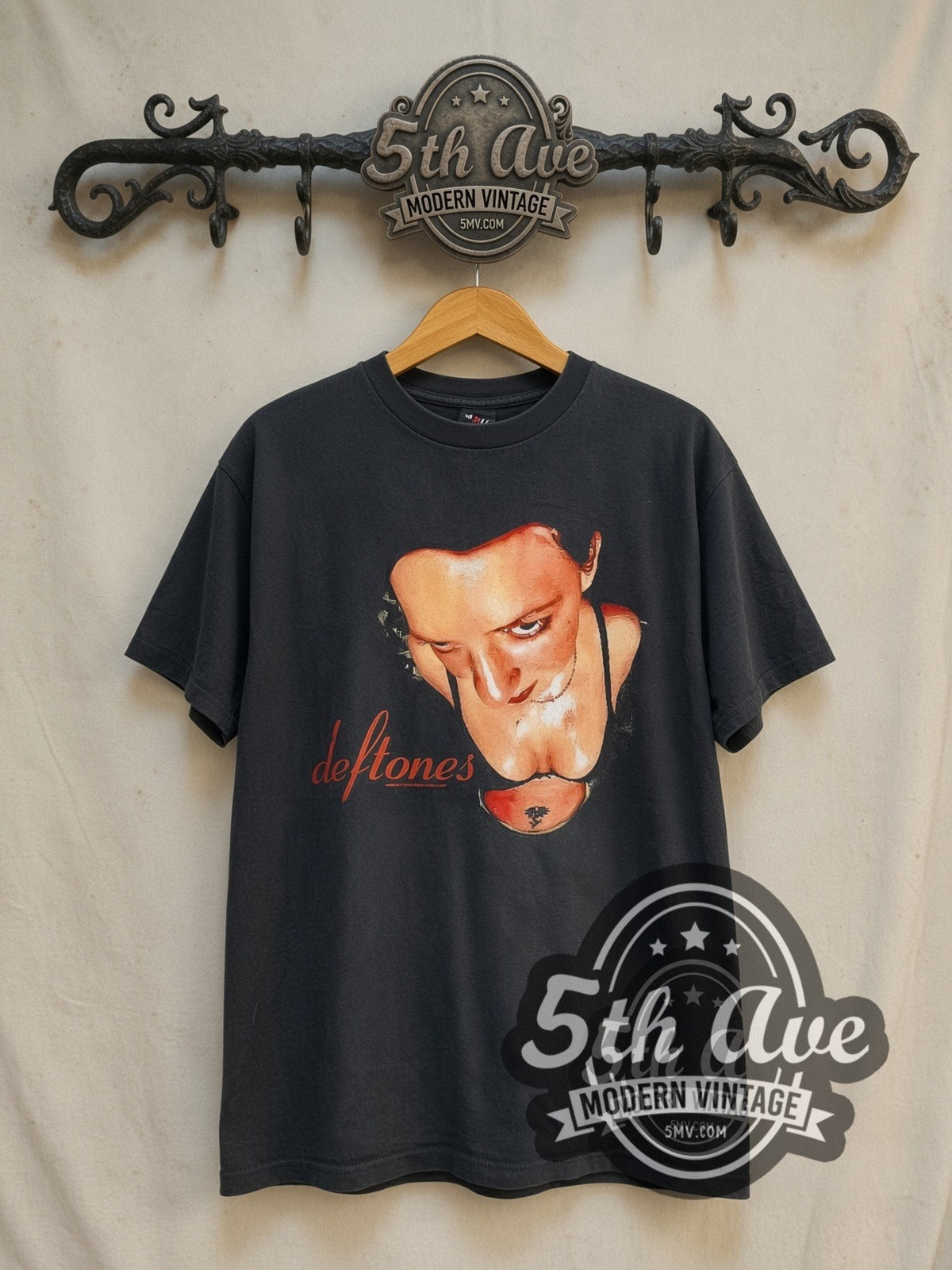 Deftones Around the Fur Red Script vintage band t-shirt in black, front view on a display rack