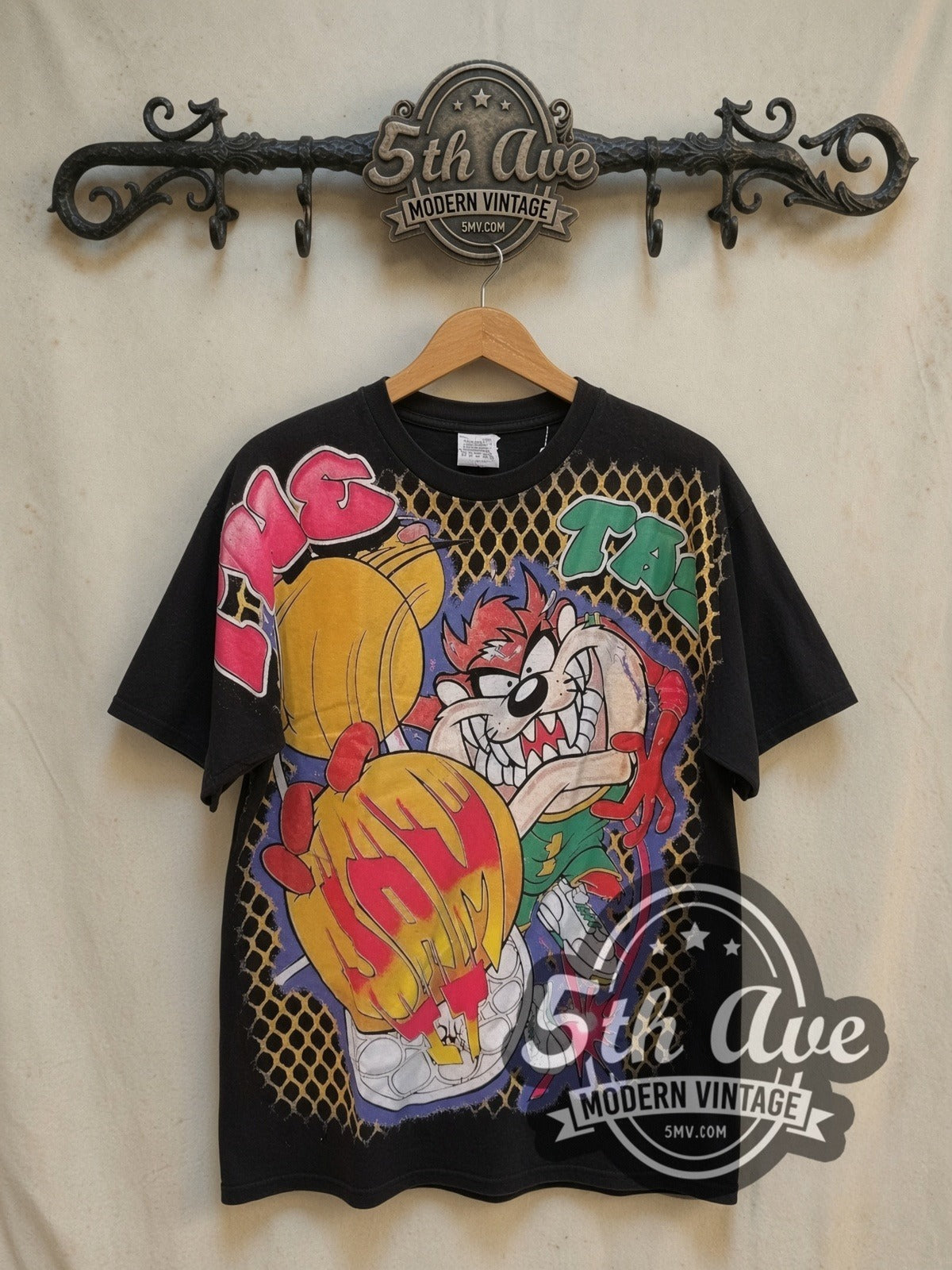 Taz Jam It vintage cartoon tee, front view on a display rack