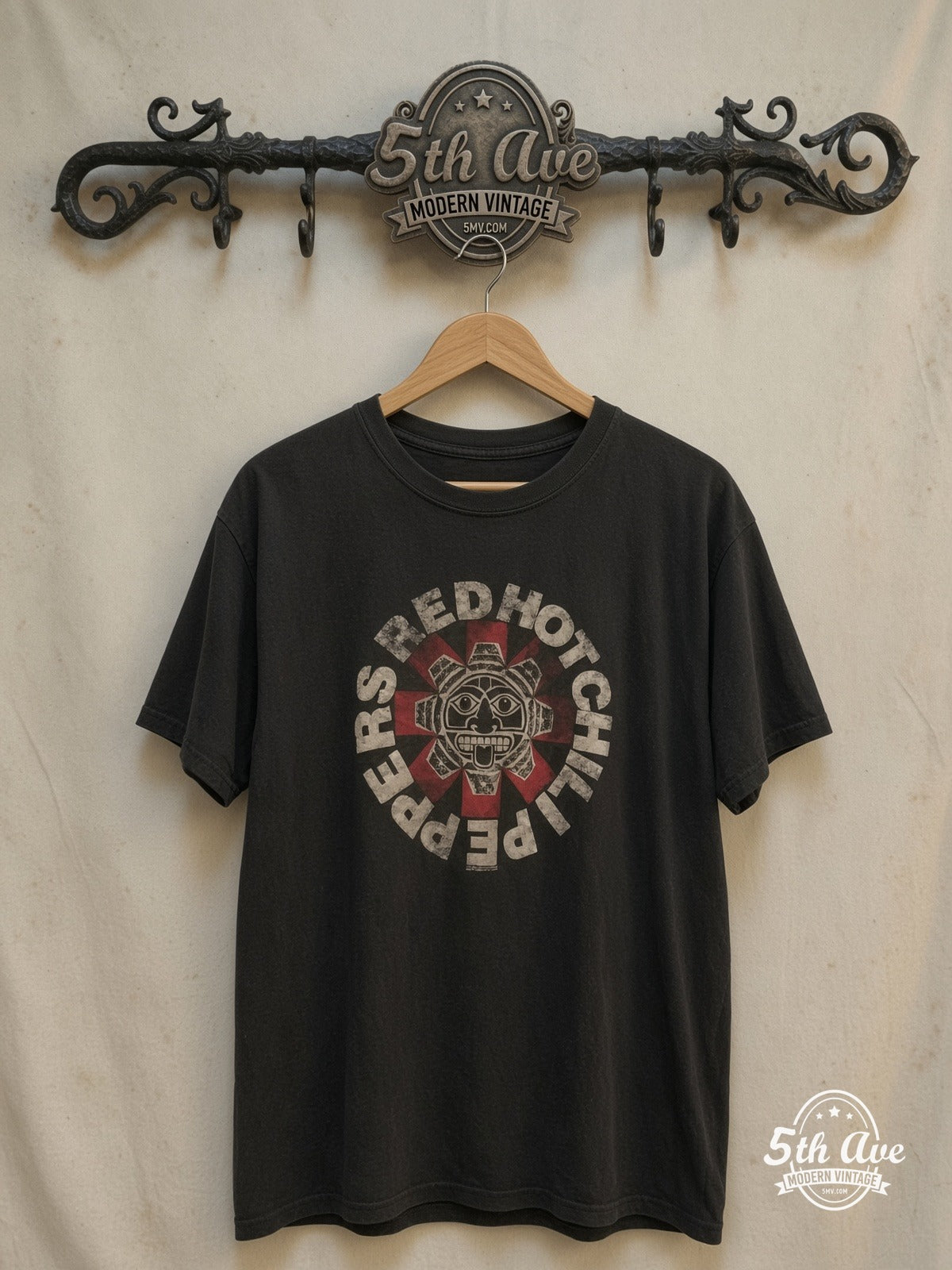 Red Hot Chili Peppers – Aztec Sun Face Asterisk Black Tee – Vintage Band T-Shirt — front on locked cream ornate 5th Ave rack