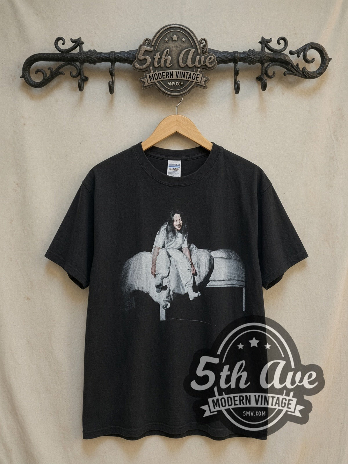 Billie Eilish vintage band t-shirt, front view on a display rack
