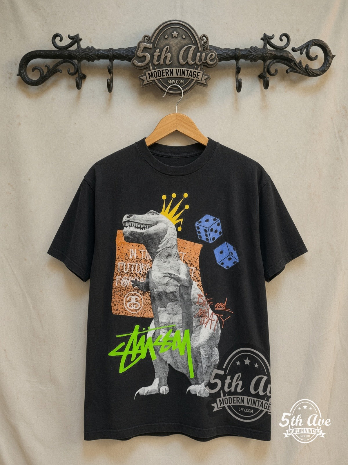 BIG and MEATY x Stüssy BIG and MEATY graphic tee in black, front view on a display rack