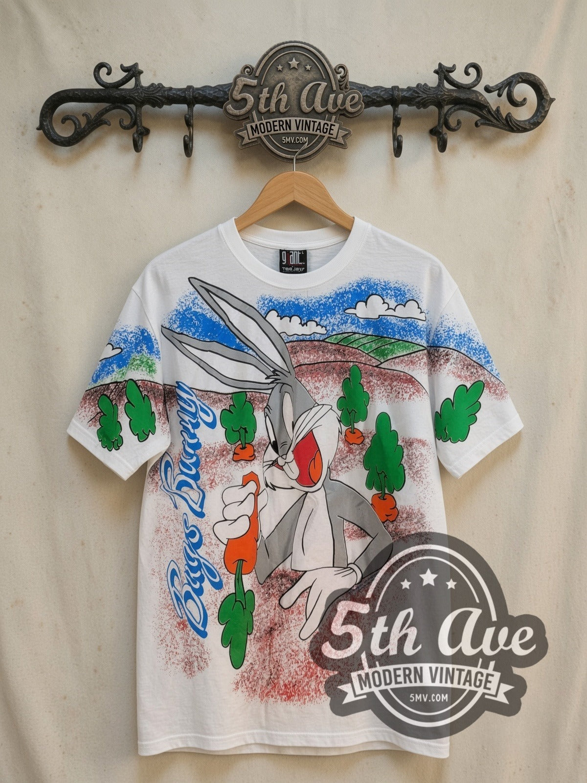 Bugs Bunny Carrot Patch all-over-print vintage cartoon tee in white, front view on a display rack