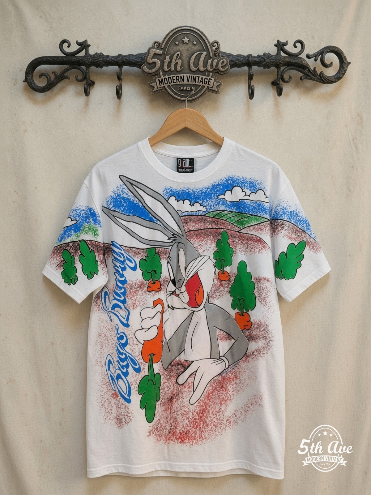 Bugs Bunny – Bugs Bunny – All Over Print – New Vintage Graphic Tee — front on locked cream ornate 5th Ave rack