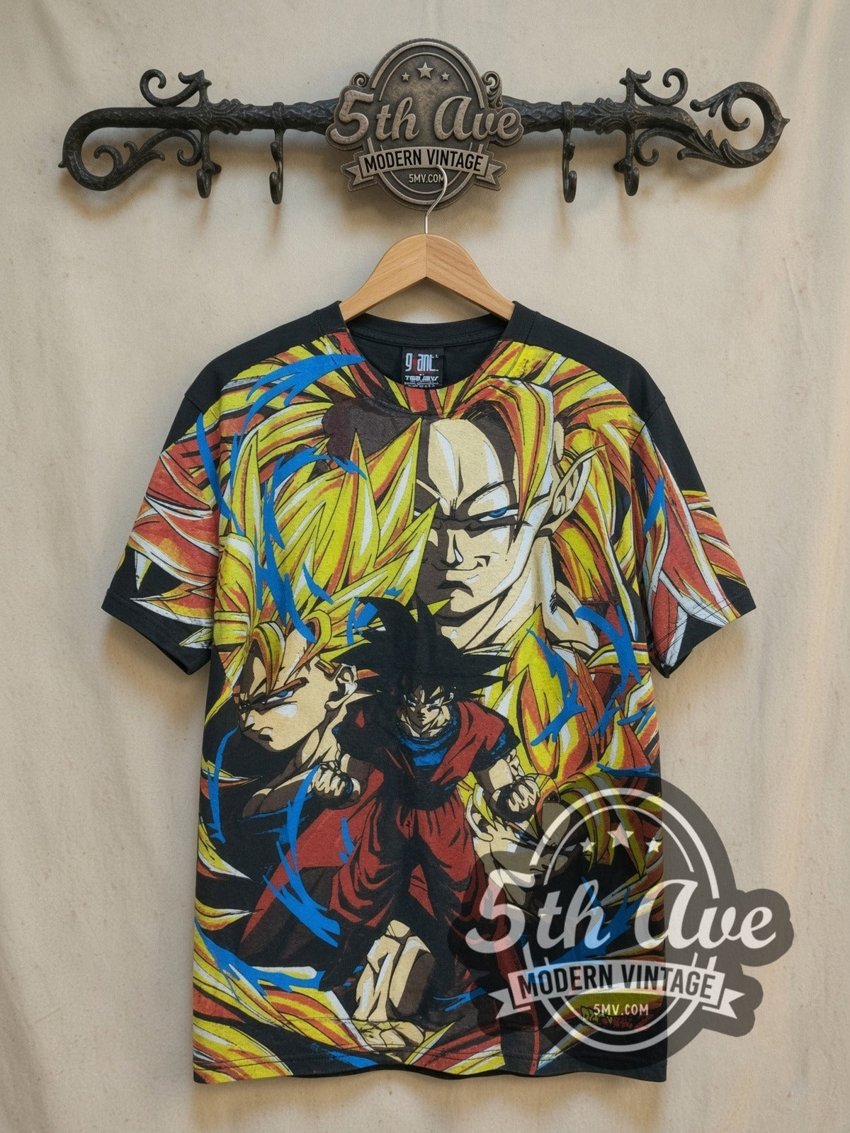 Dragon Ball Z Goku Super Saiyan all-over-print vintage graphic t-shirt, front view on a display rack