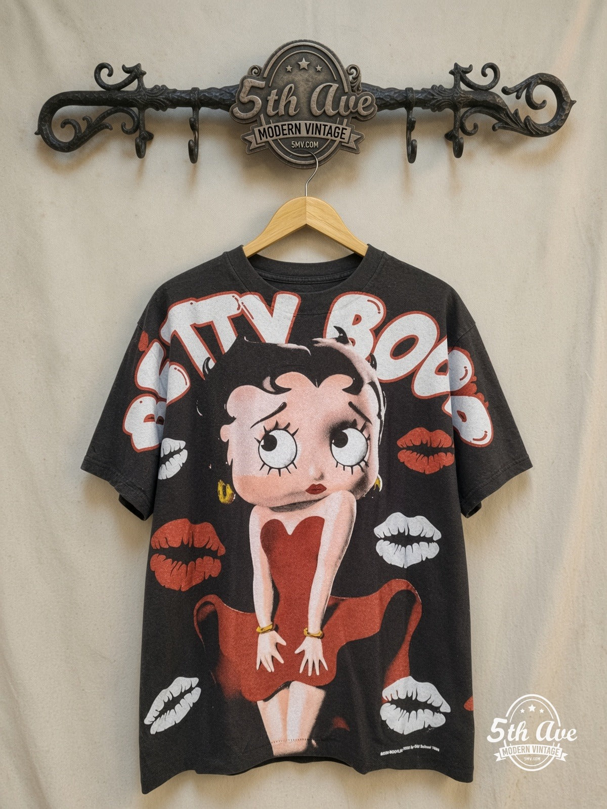 Betty Boop I'm a Betty Girl graphic tee, front view on a display rack