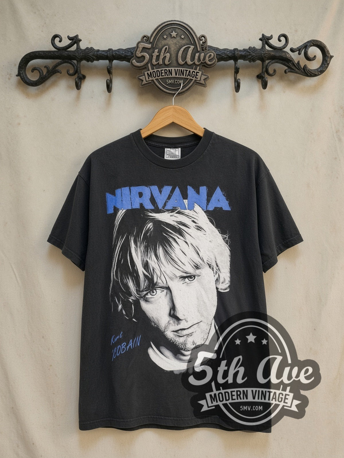 Nirvana Kurt Cobain Blue Logo Play Electric Guitar vintage band t-shirt in black, front view on the 5MV rack