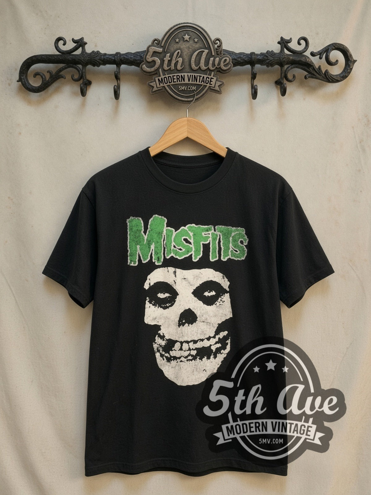 Misfits Green Logo Crimson Ghost Skull vintage band t-shirt, front view on a display rack