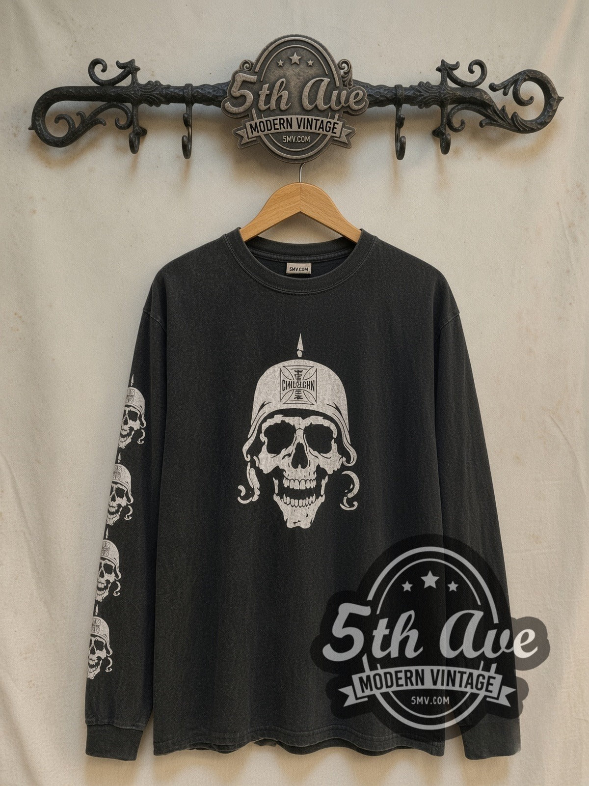 West Coast Choppers Skull Helmet / Maltese Cross Long Sleeve graphic tee, front view on a display rack
