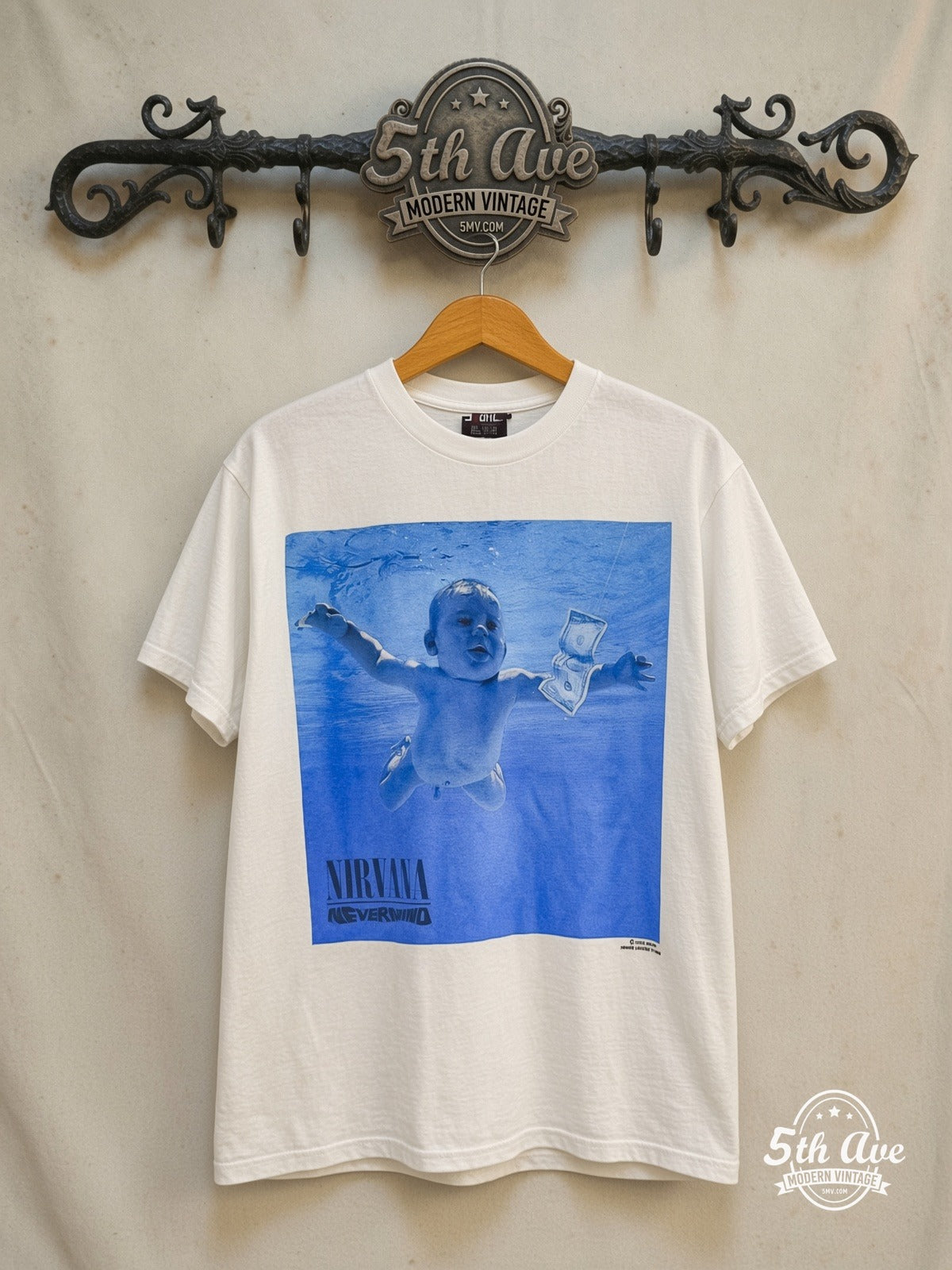Nirvana – Nevermind Song List – Vintage Band T-Shirt — front on locked cream ornate 5th Ave rack