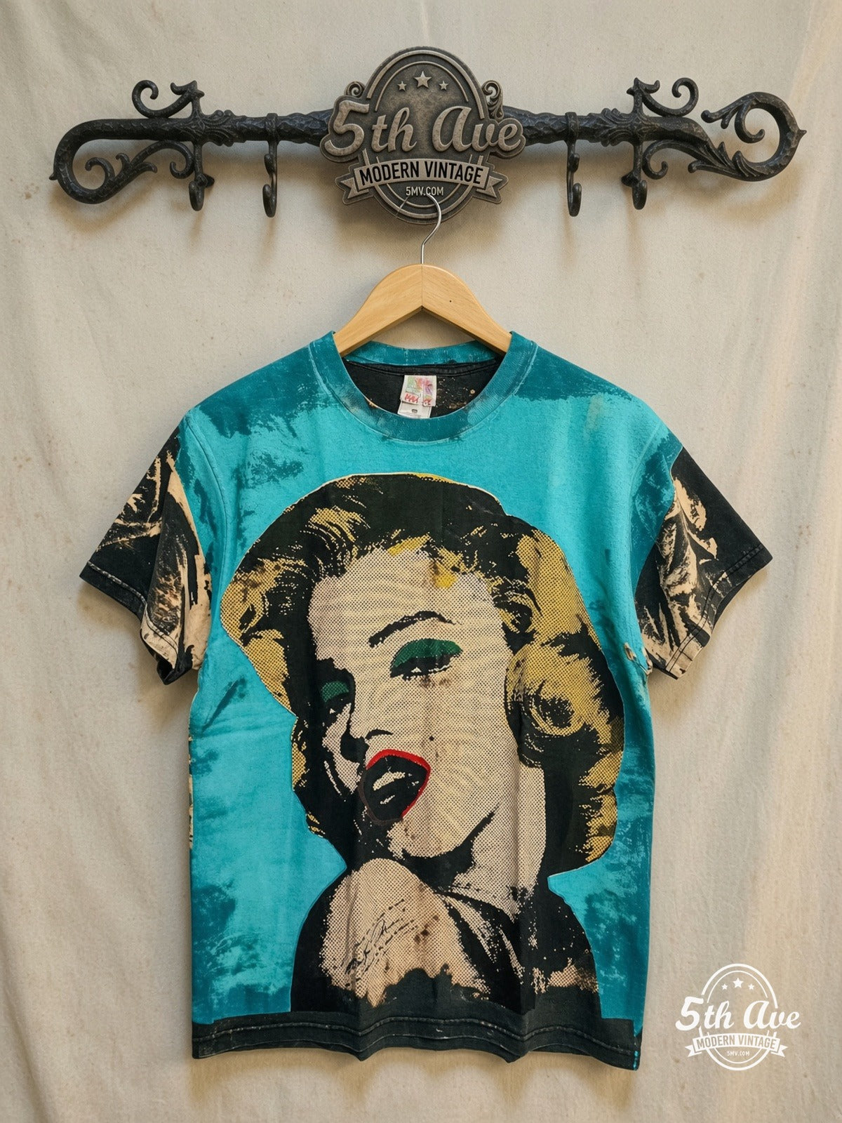 Marilyn Monroe – All-Over Print Graphic – Vintage Graphic Tee — front on locked cream ornate 5th Ave rack