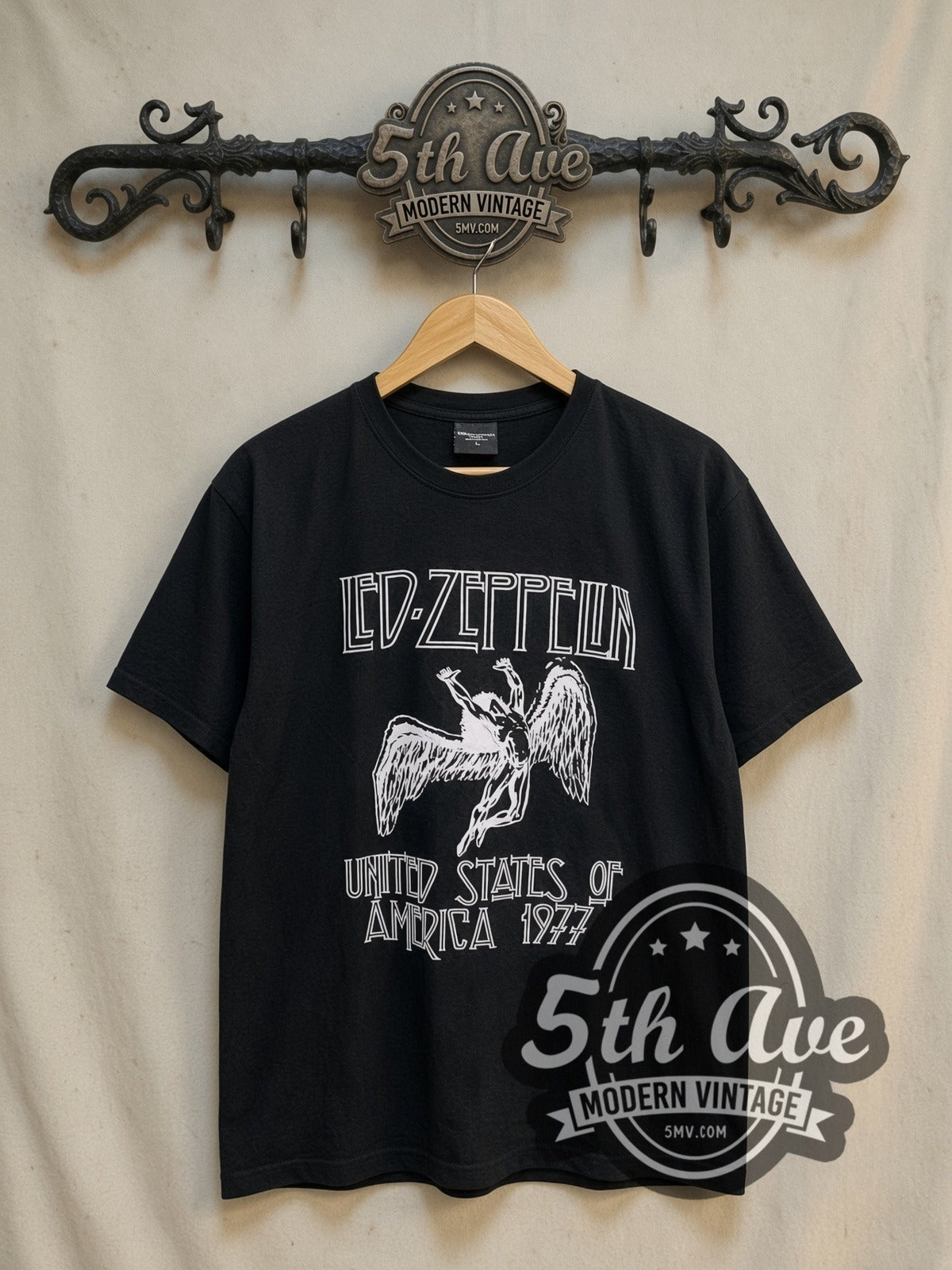 Led Zeppelin United States of America 1977 vintage band t-shirt, front view on a display rack