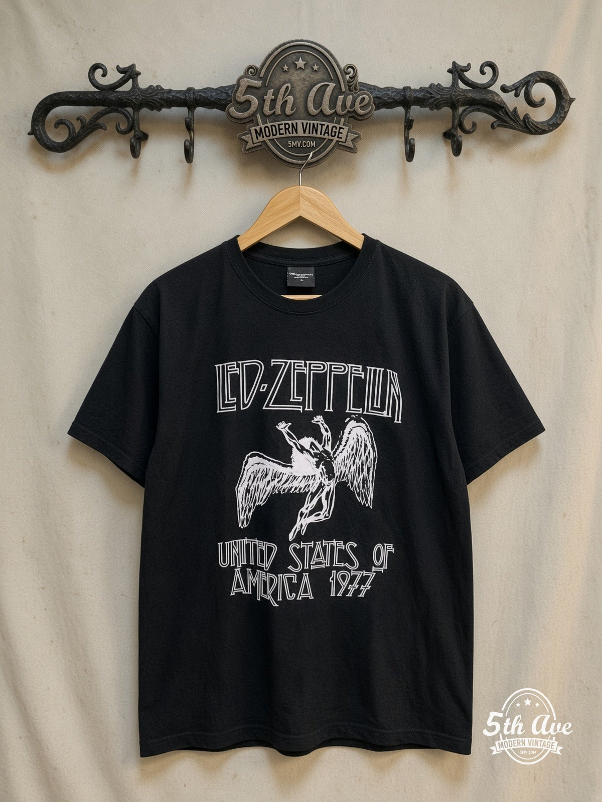 Led Zeppelin – United States of America 1977 – Vintage Band T-Shirt — front on locked cream ornate 5th Ave rack