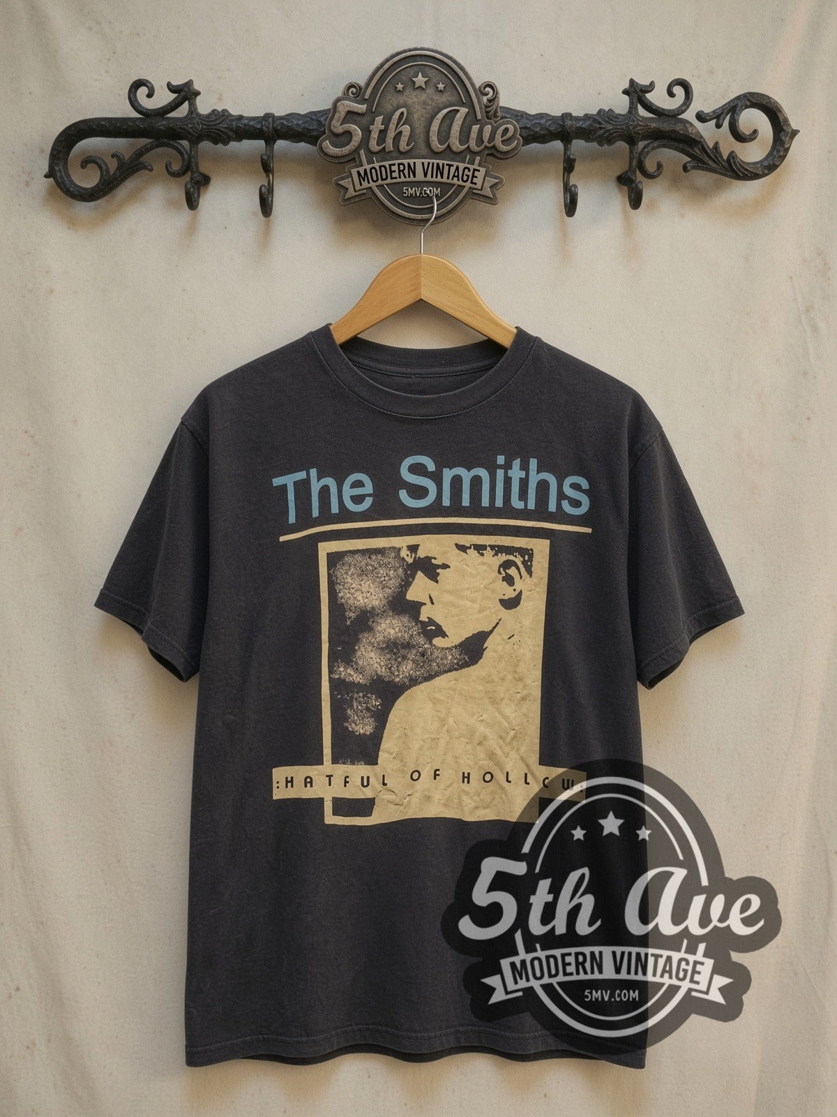 The Smiths Hatful of Hollow Album Art vintage band t-shirt, front view on a display rack