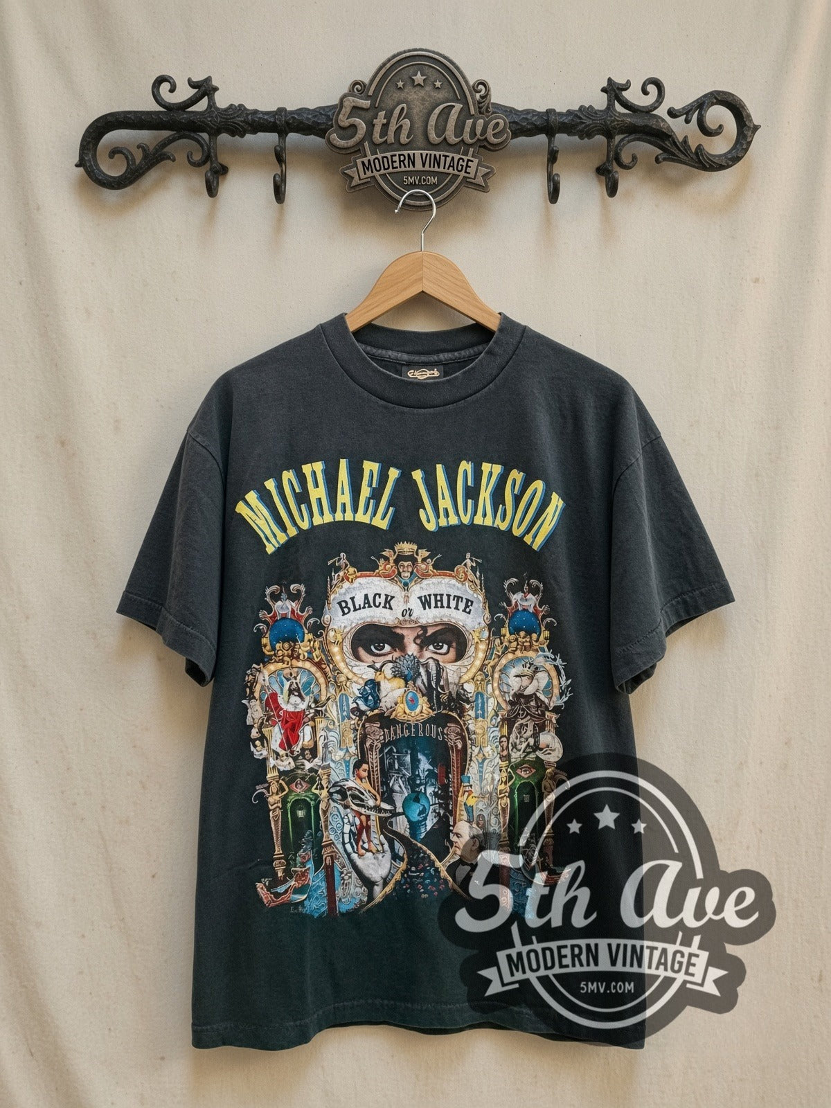 Michael Jackson Black or White Dangerous World Tour 1993 vintage band t-shirt in black, front view on a display rack