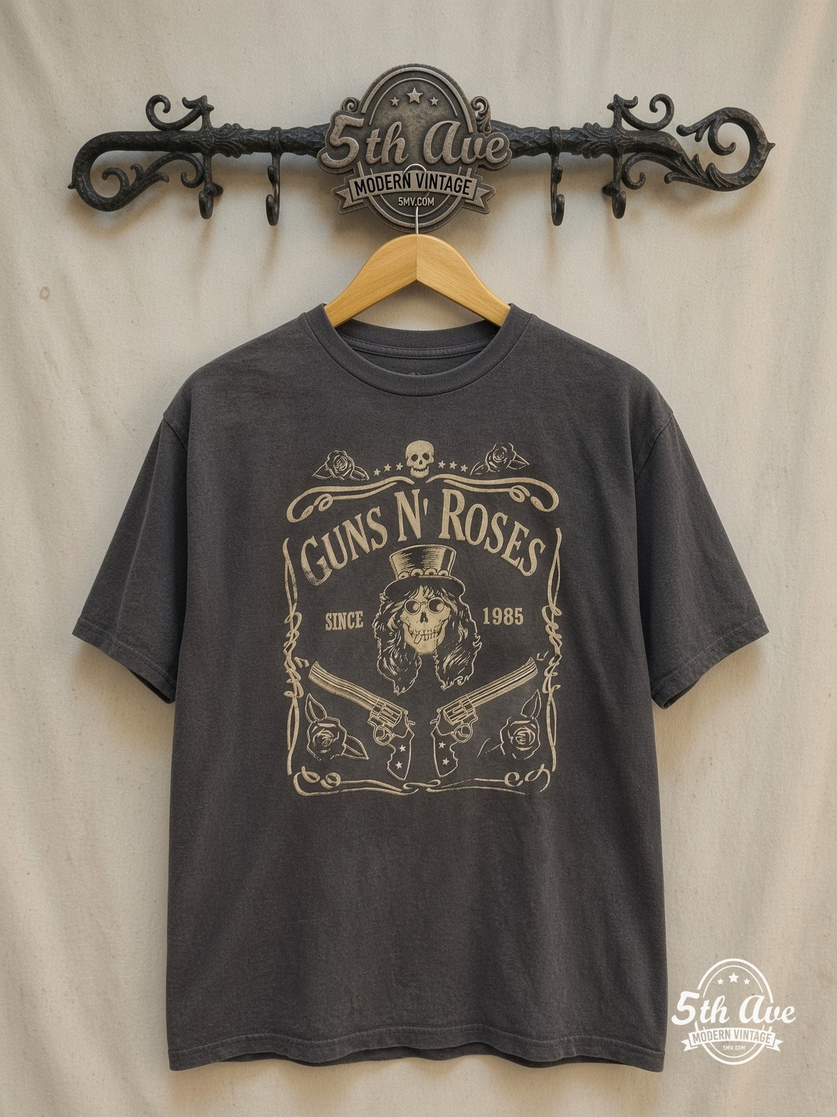Rock 'n' Roll Reverie: Guns N' Roses Enzyme-Washed Tribute Tee – Vintage Band T-Shirt — front on locked cream ornate 5th Ave rack