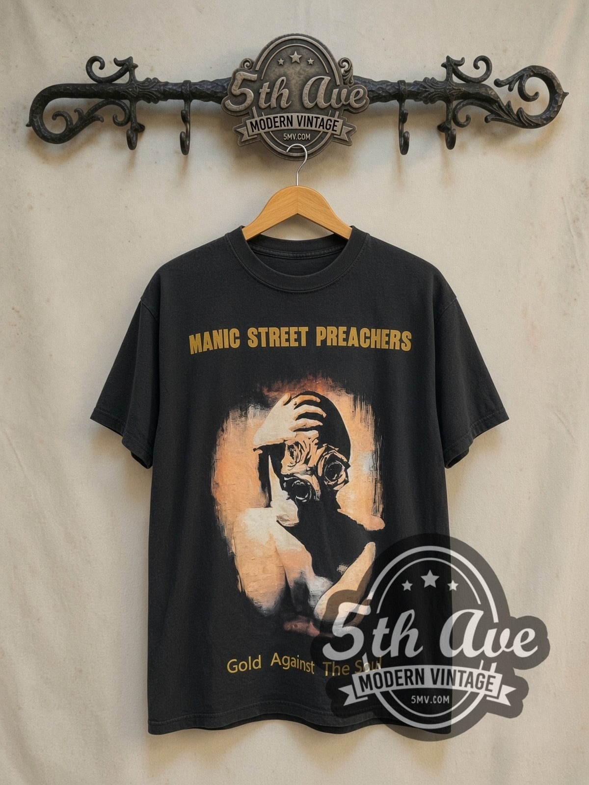 Manic Street Preachers Gold Against the Soul vintage band t-shirt in black, front view on a display rack