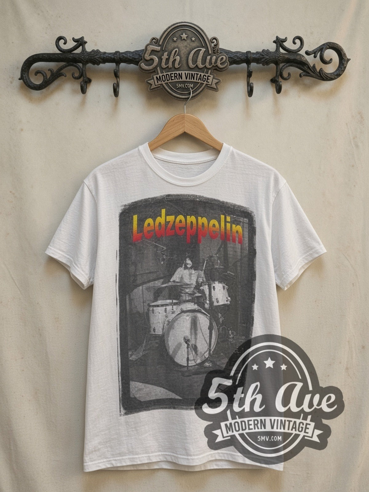 Led Zeppelin Drummer Tribute vintage band t-shirt, front view on a display rack