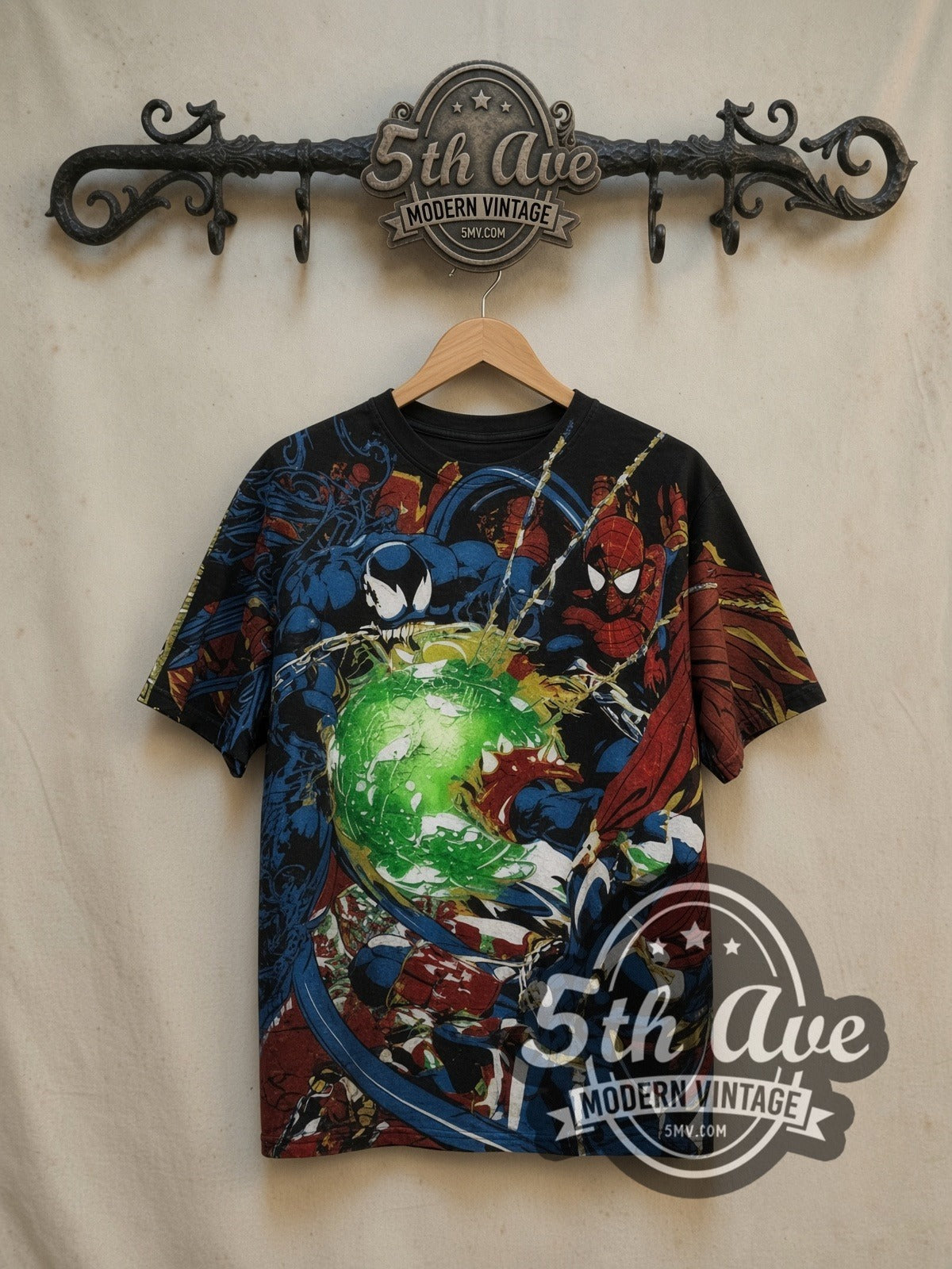 Spider-Man Night of Chaos vs Venom all-over-print vintage cartoon tee, front view on a display rack