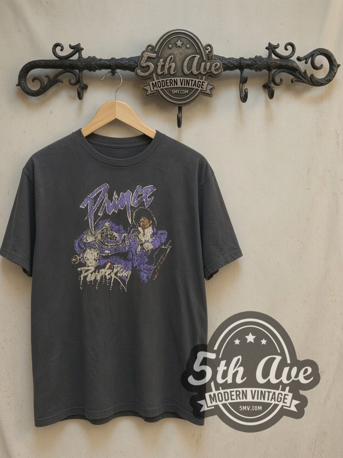 Prince Purple Rain Motorcycle Movie Poster vintage band t-shirt, front view on a display rack