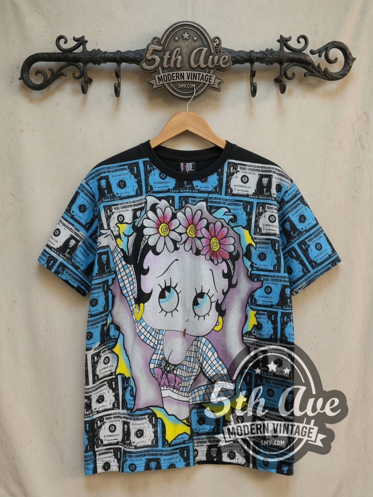 Betty Boop Vintage Animation T-Shirt Iconic Design all-over-print vintage cartoon tee, front view on a display rack