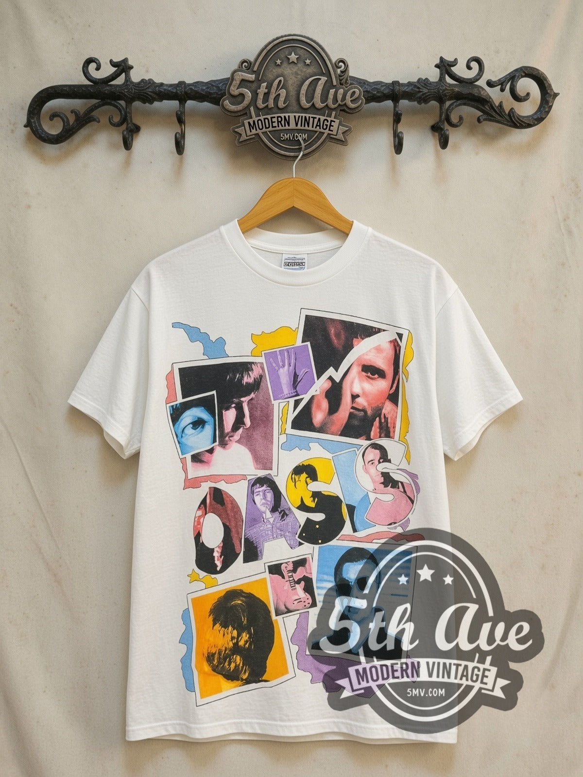 Oasis Polaroid photograph vintage band t-shirt in white, front view on a display rack