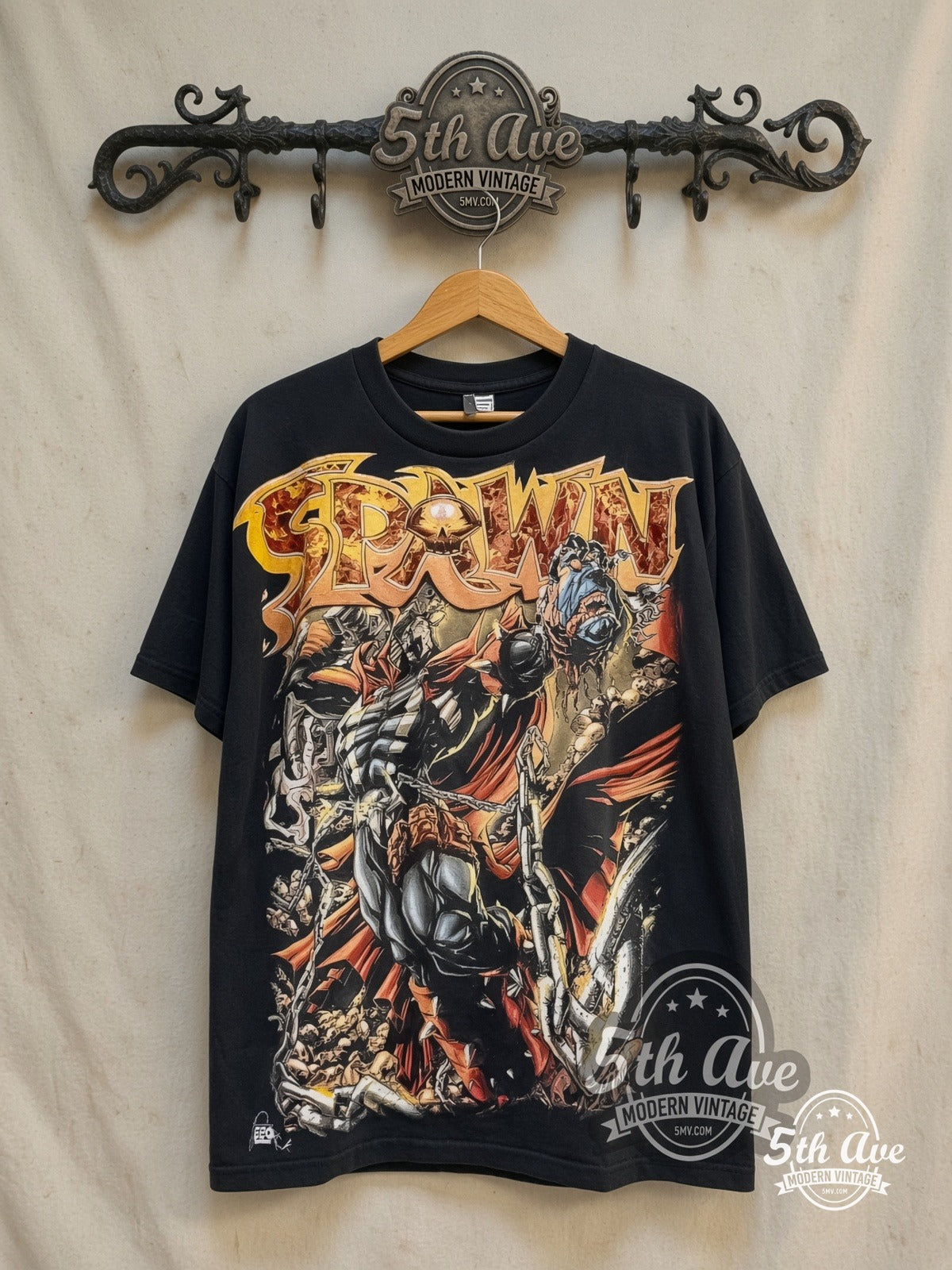 Spawn – SLAM – All Over Print – New Vintage Graphic Tee — front on locked cream ornate 5th Ave rack