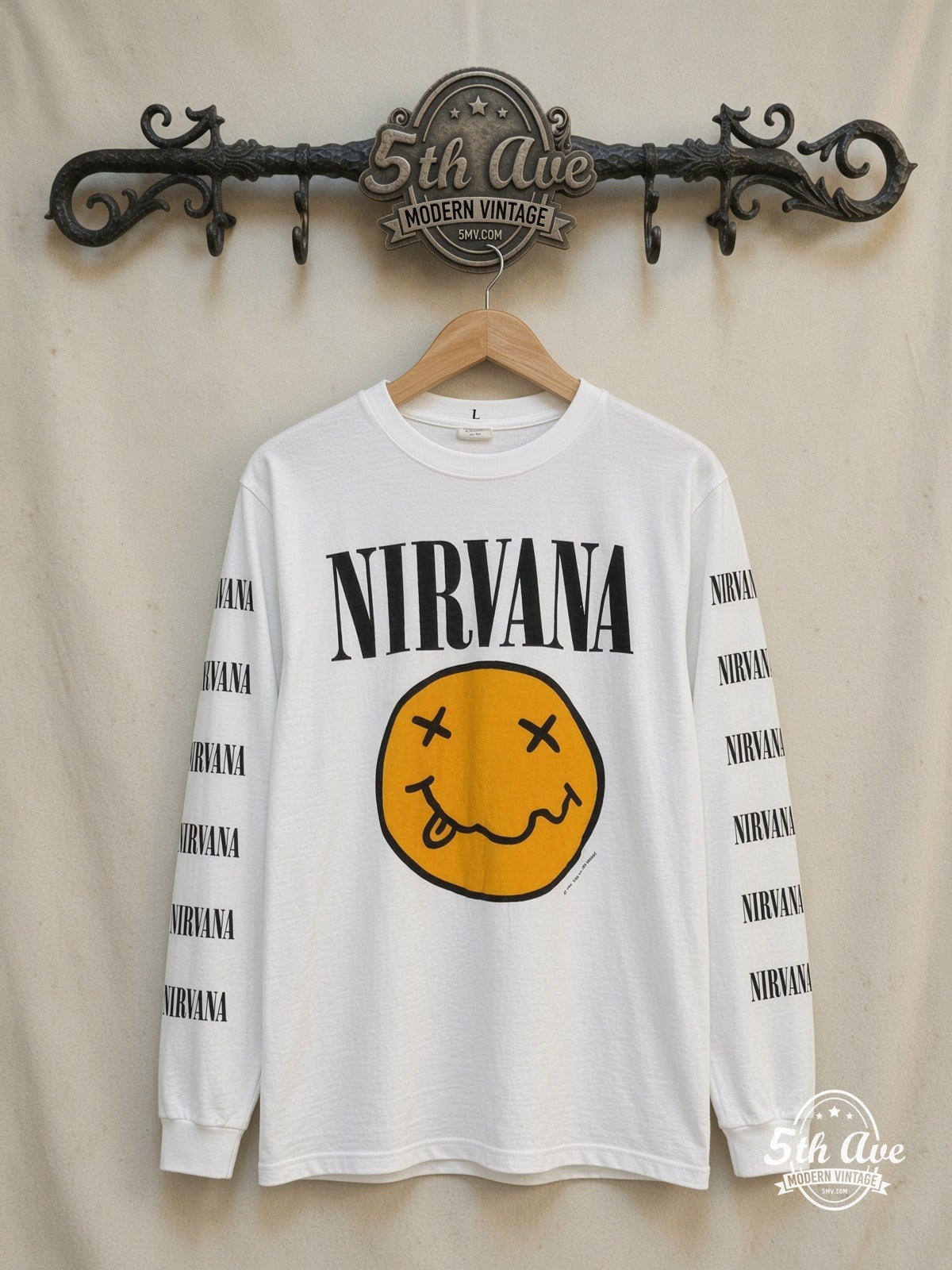Nirvana Smiley Face In Utero Tour long sleeve vintage band t-shirt in white, front view on a display rack