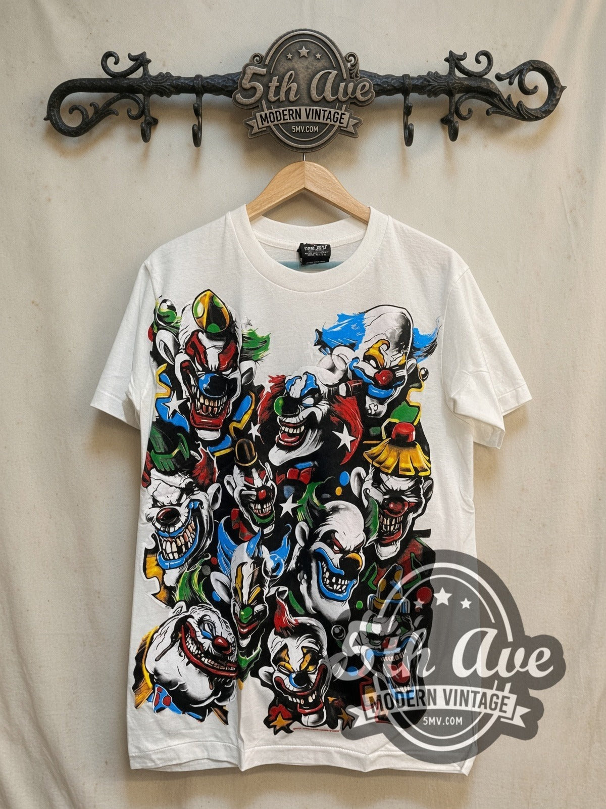Laughing Clown Classic Clown vintage graphic tee, front view on a display rack