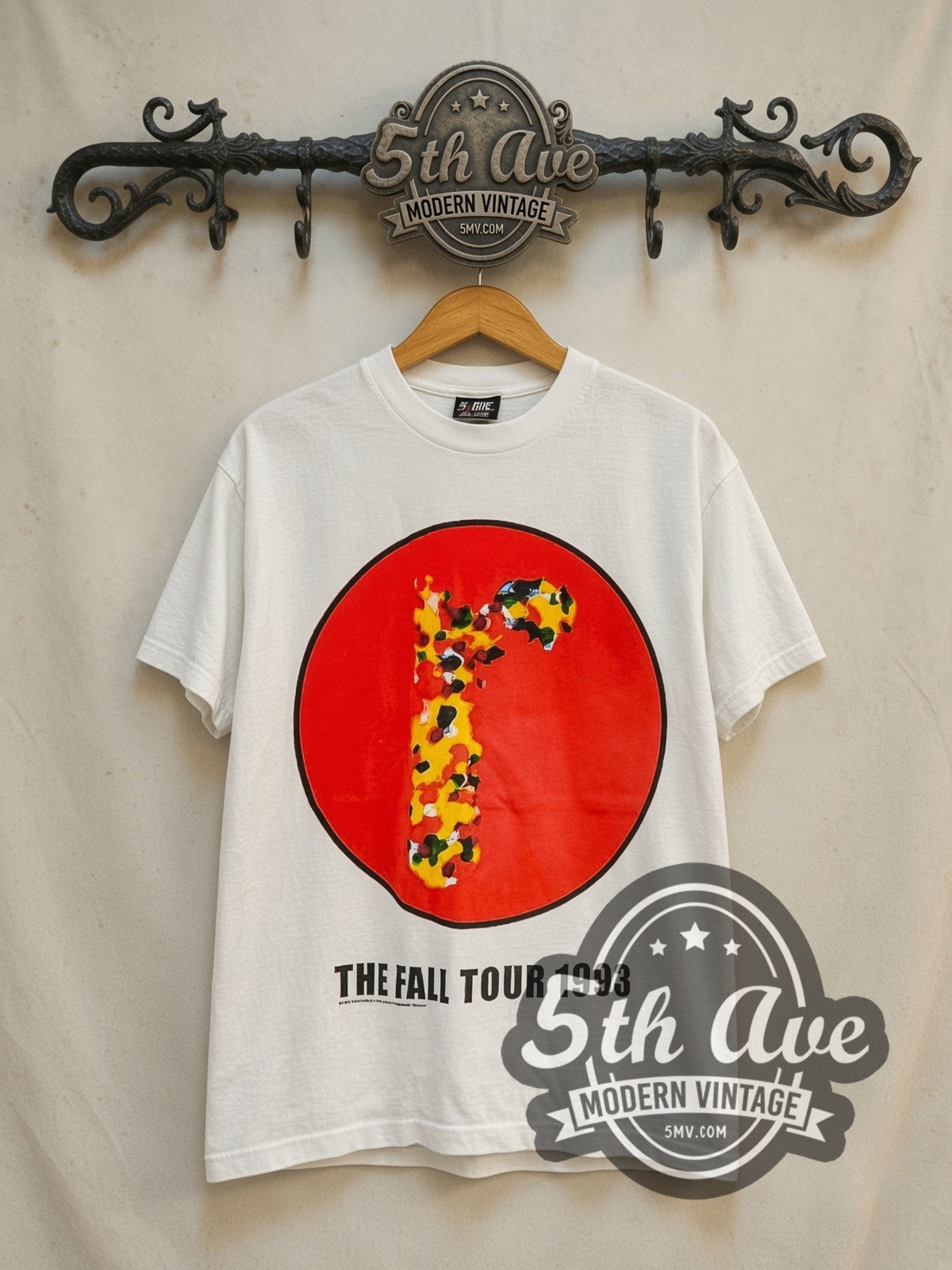 Radiohead The Fall Tour 1993 vintage band t-shirt in white, front view on a display rack