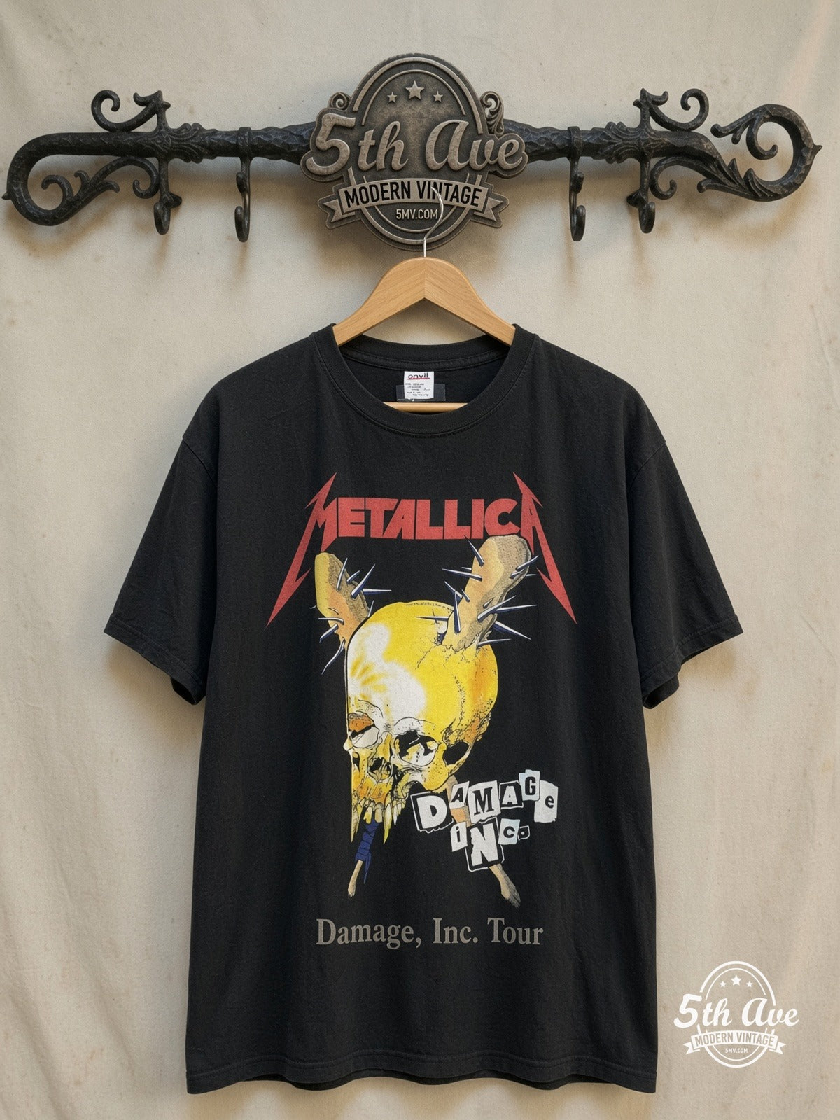 Metallica – Damage, Inc. Tour – Vintage Band T-Shirt — front on locked cream ornate 5th Ave rack