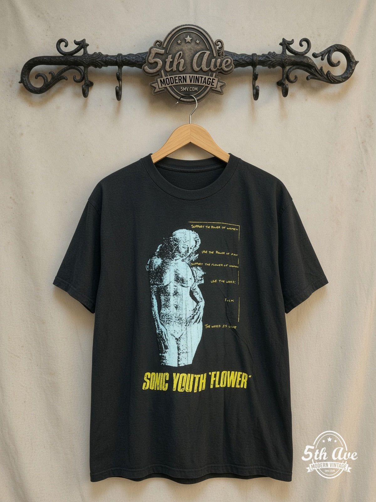 Sonic Youth – Flower – Vintage Band T-Shirt — front on locked cream ornate 5th Ave rack