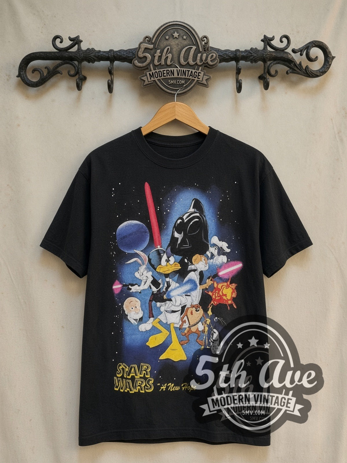 Bugs Bunny and Friends x Star Wars vintage cartoon tee in black, front view on a display rack