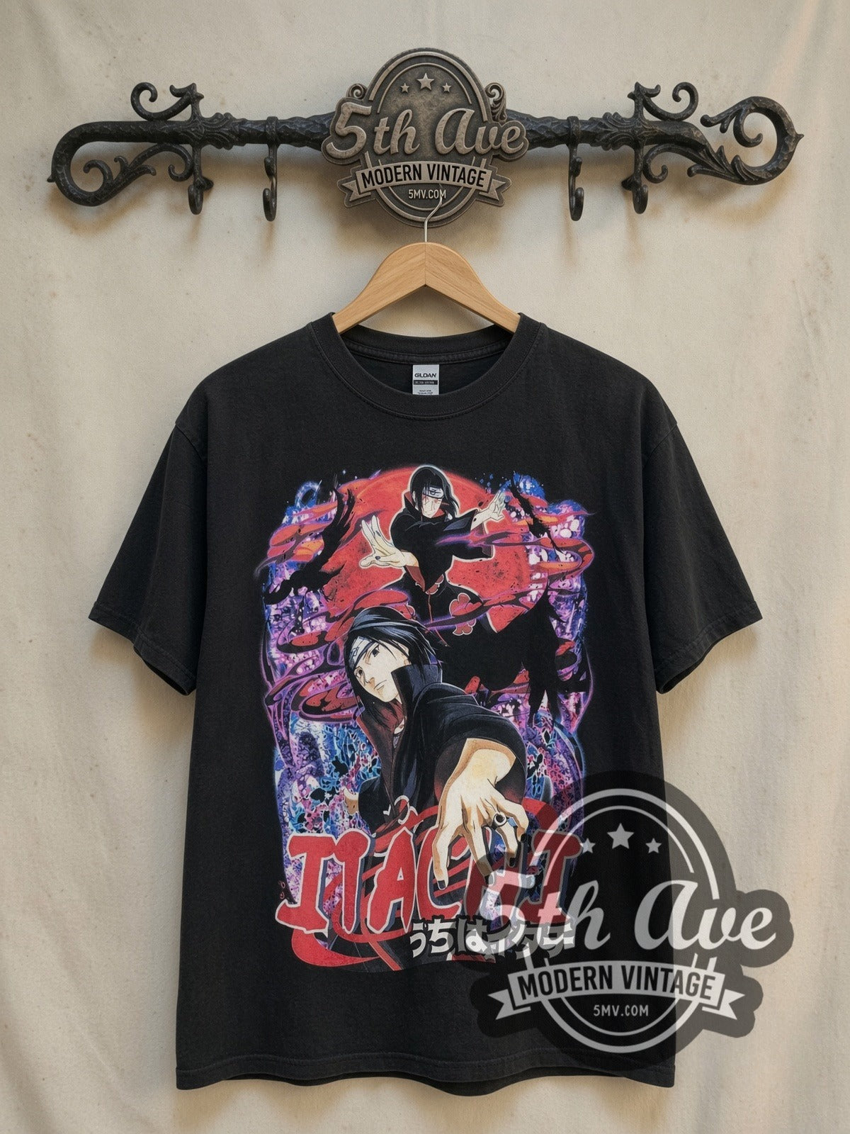 Naruto Shippuden Itachi Uchiha all-over-print vintage graphic t-shirt, front view on a display rack