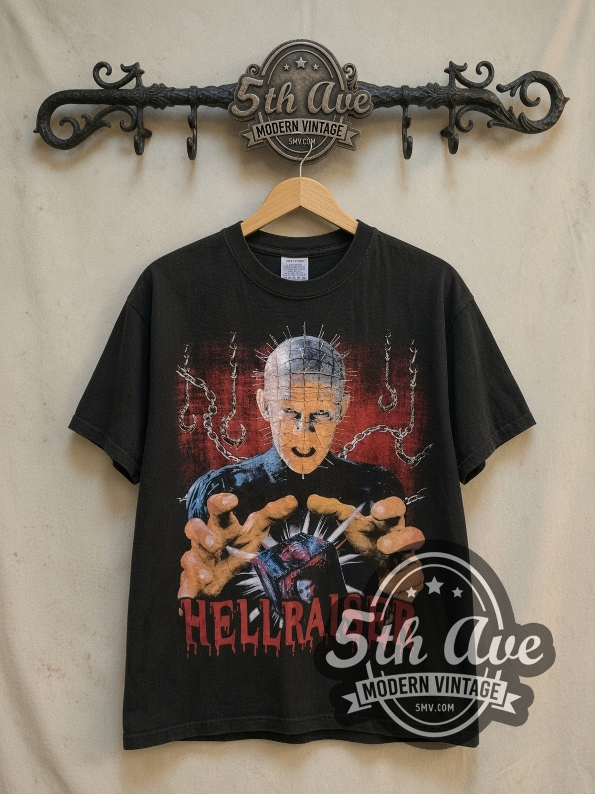 Hellraiser Puzzle Box vintage graphic t-shirt, front view on a display rack