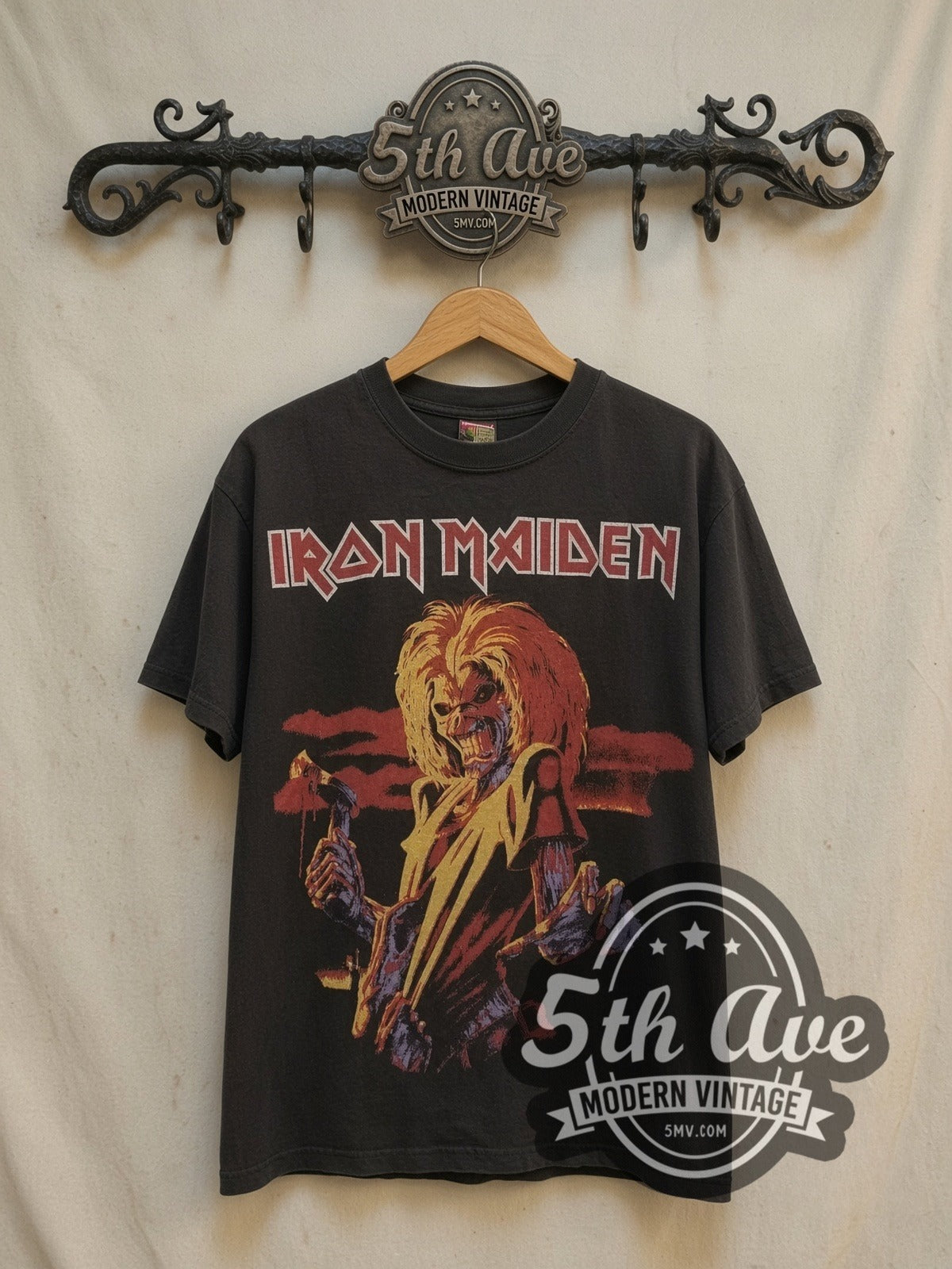 Iron Maiden Latin America Tour 1996 vintage band t-shirt, front view on a display rack