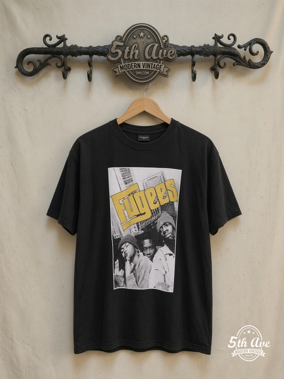 Fugees – Vintage Band T-Shirt — front on locked cream ornate 5th Ave rack