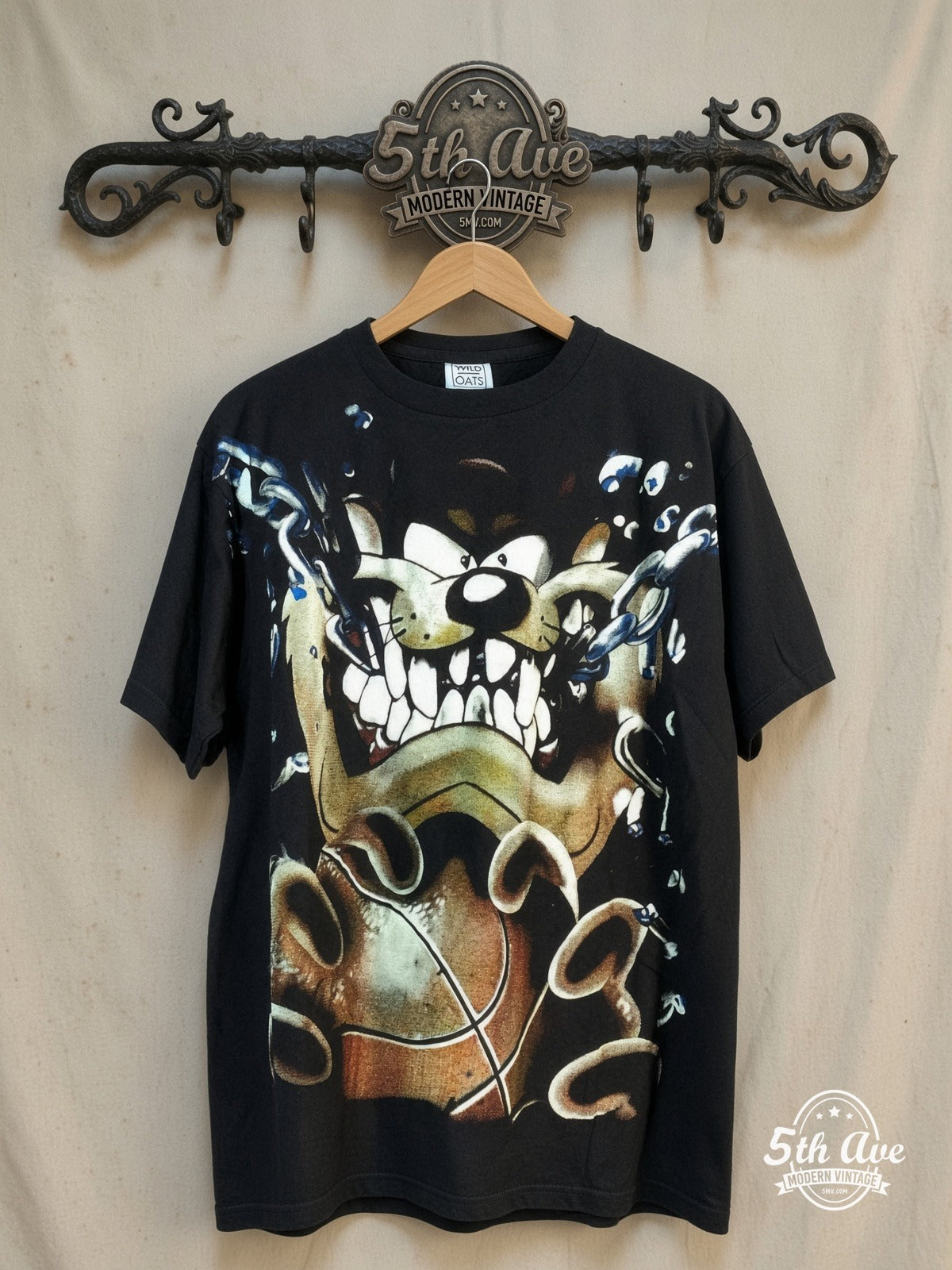 Looney Tunes – Taz-Mania Taz Tunes AOP Vintage T-Shirt – New Vintage Graphic Tee — front on locked cream ornate 5th Ave rack