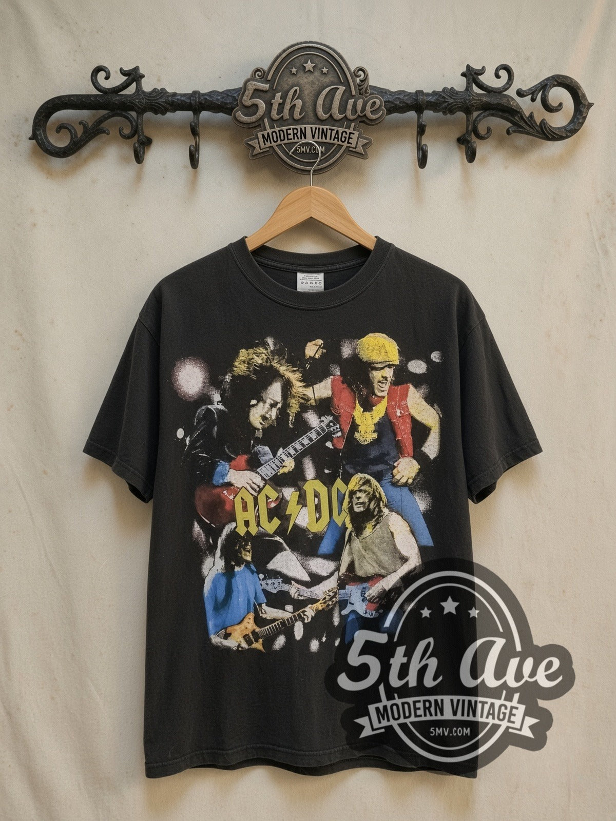 AC/DC Rock Legends vintage band t-shirt, front view on a display rack