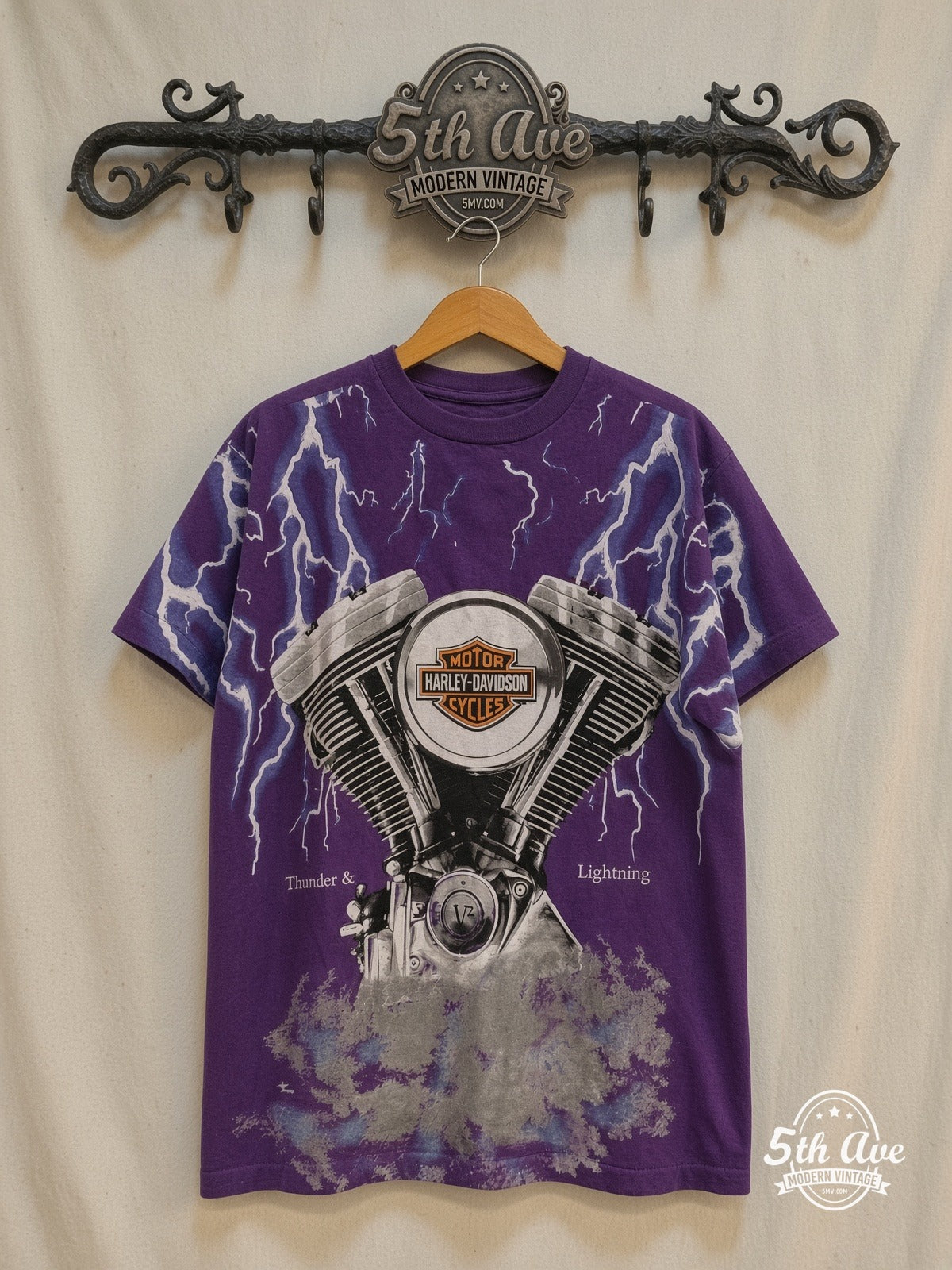 Harley-Davidson – Thunder & Lightning Appleton Wisc Purple – Vintage Band T-Shirt — front on locked cream ornate 5th Ave rack